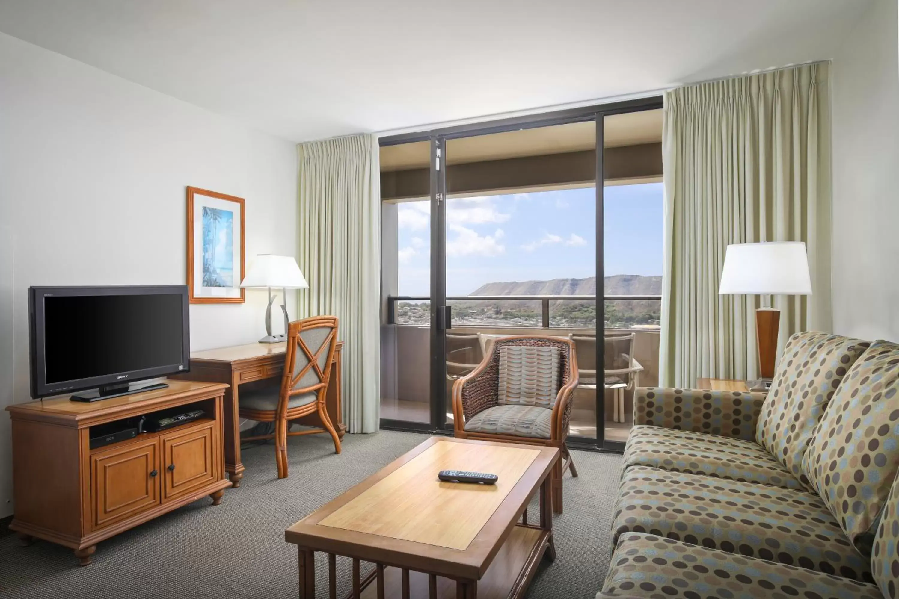 Two-Bedroom Suite with Partial Ocean View in Aston Waikiki Sunset Two-Bedroom Suite with Partial Ocean View in Aston Waikiki Sunset