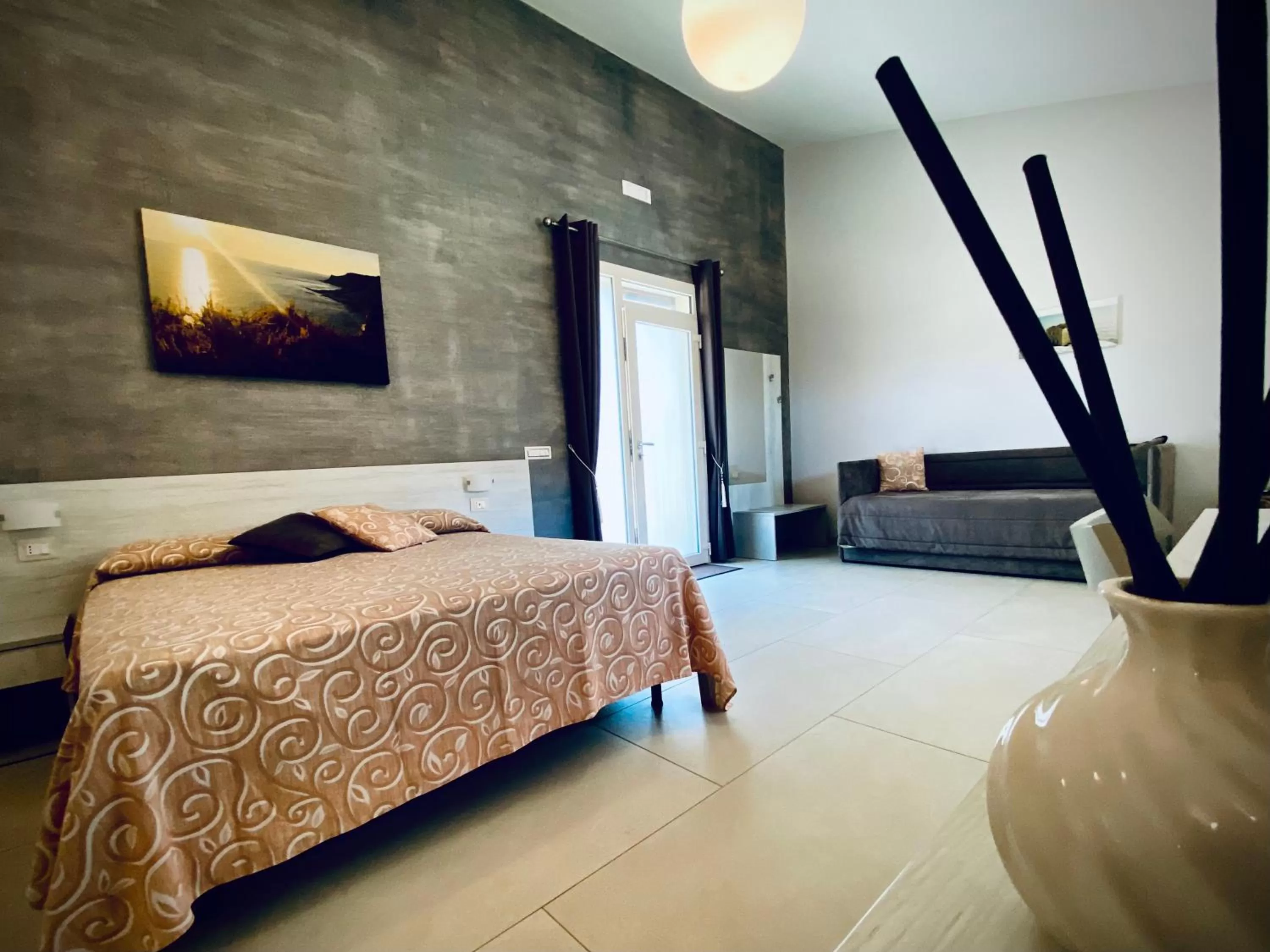 Photo of the whole room, Bed in B&B L'EDEN DI CAPO BIANCO