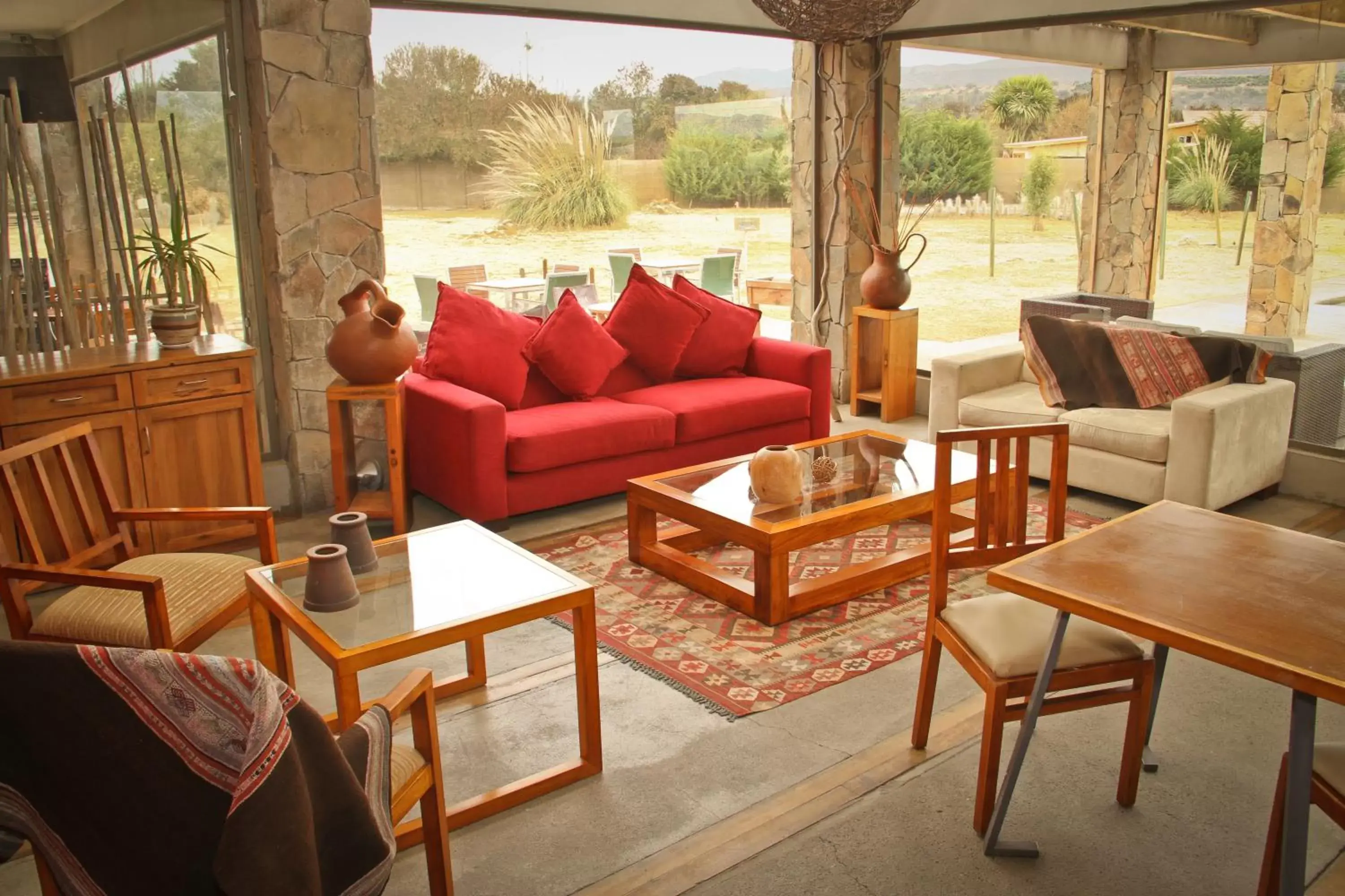 Communal lounge/ TV room, Seating Area in Hotel Limari