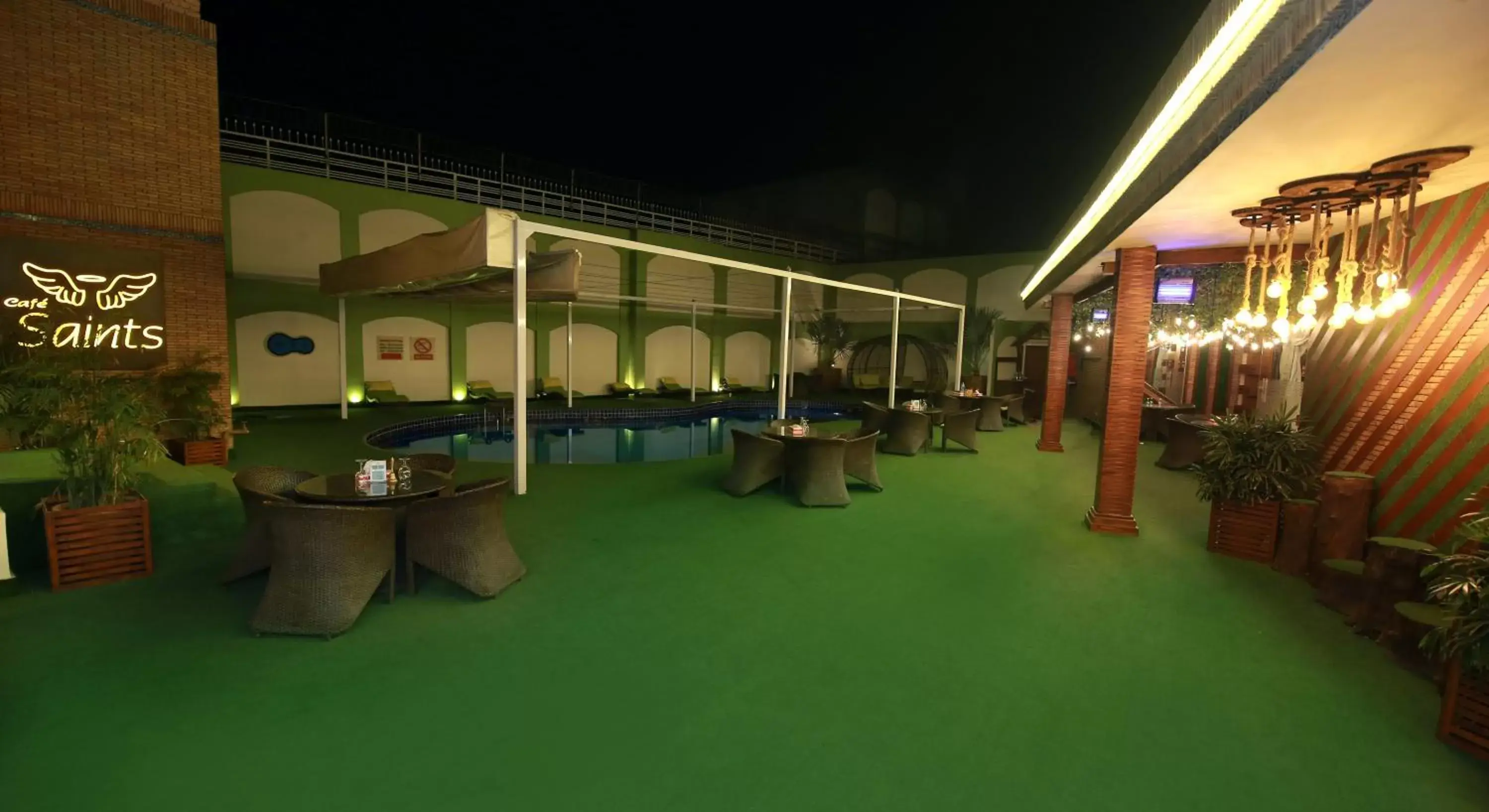 Swimming pool, Fitness Center/Facilities in Ramada by Wyndham Multan