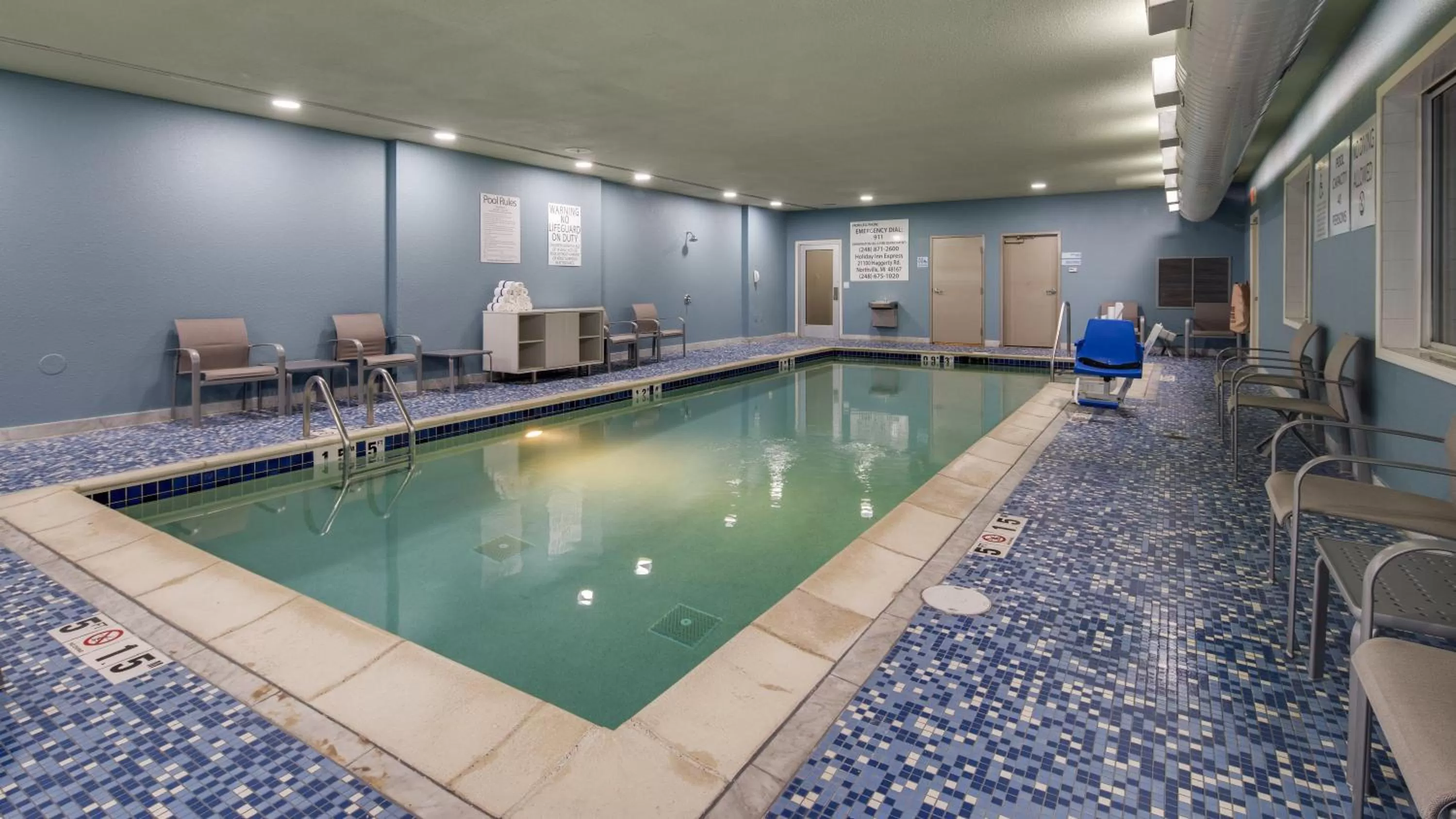 Swimming pool in Holiday Inn Express & Suites Detroit - Farmington Hills by IHG