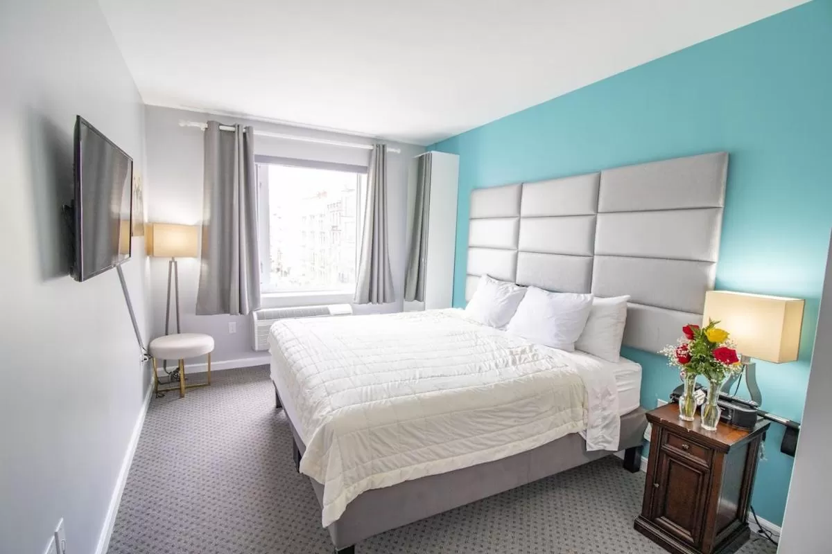 Bed in Canal Loft Hotel