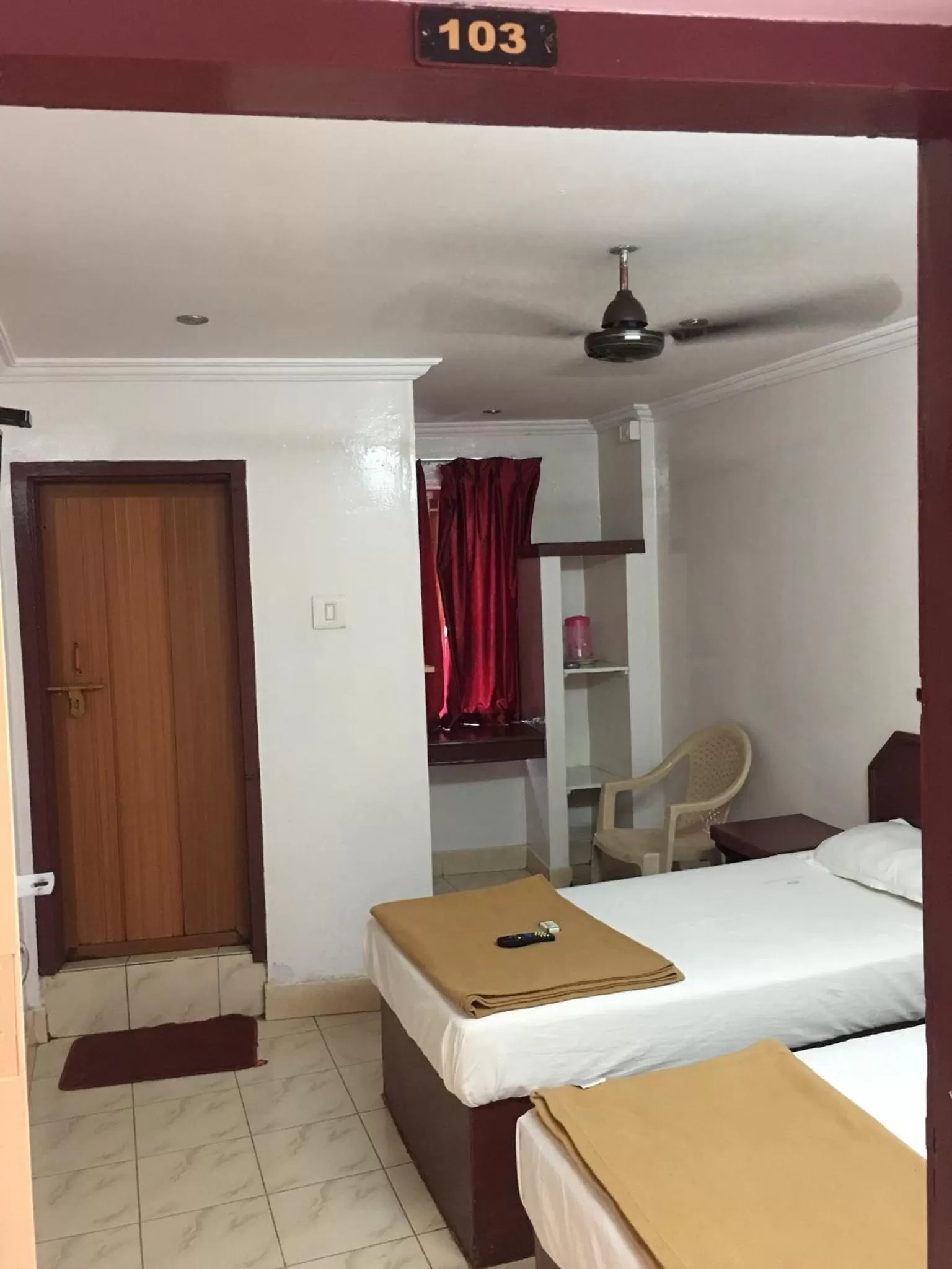 Photo of the whole room, Bathroom in Anandan Tourist Home