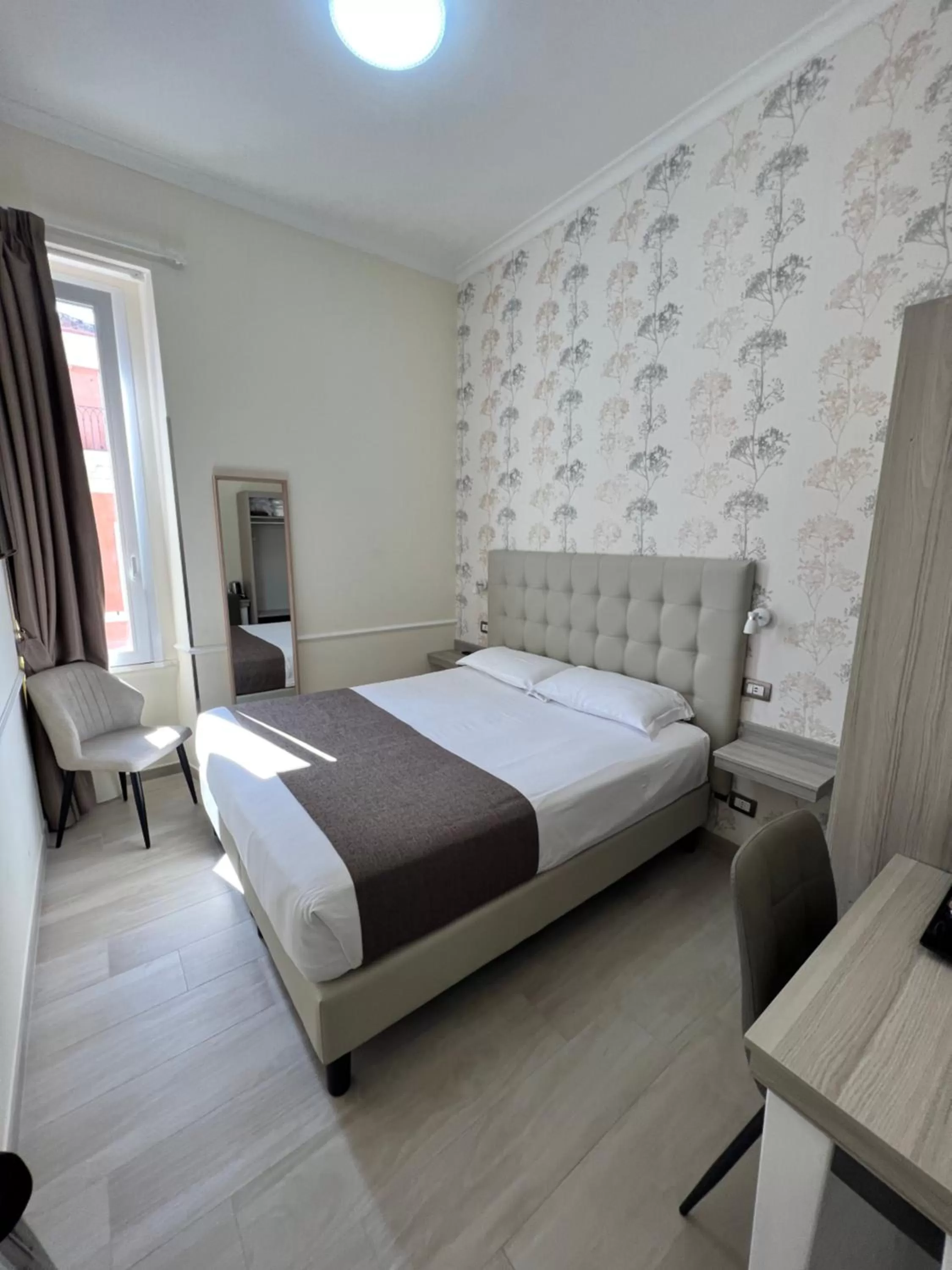 Bed in Hotel Le Petit