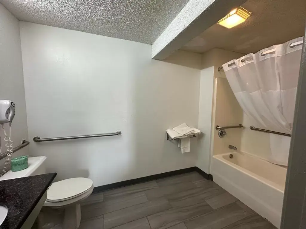 Bathroom in Days Inn by Wyndham Decatur Priceville I-65 Exit 334