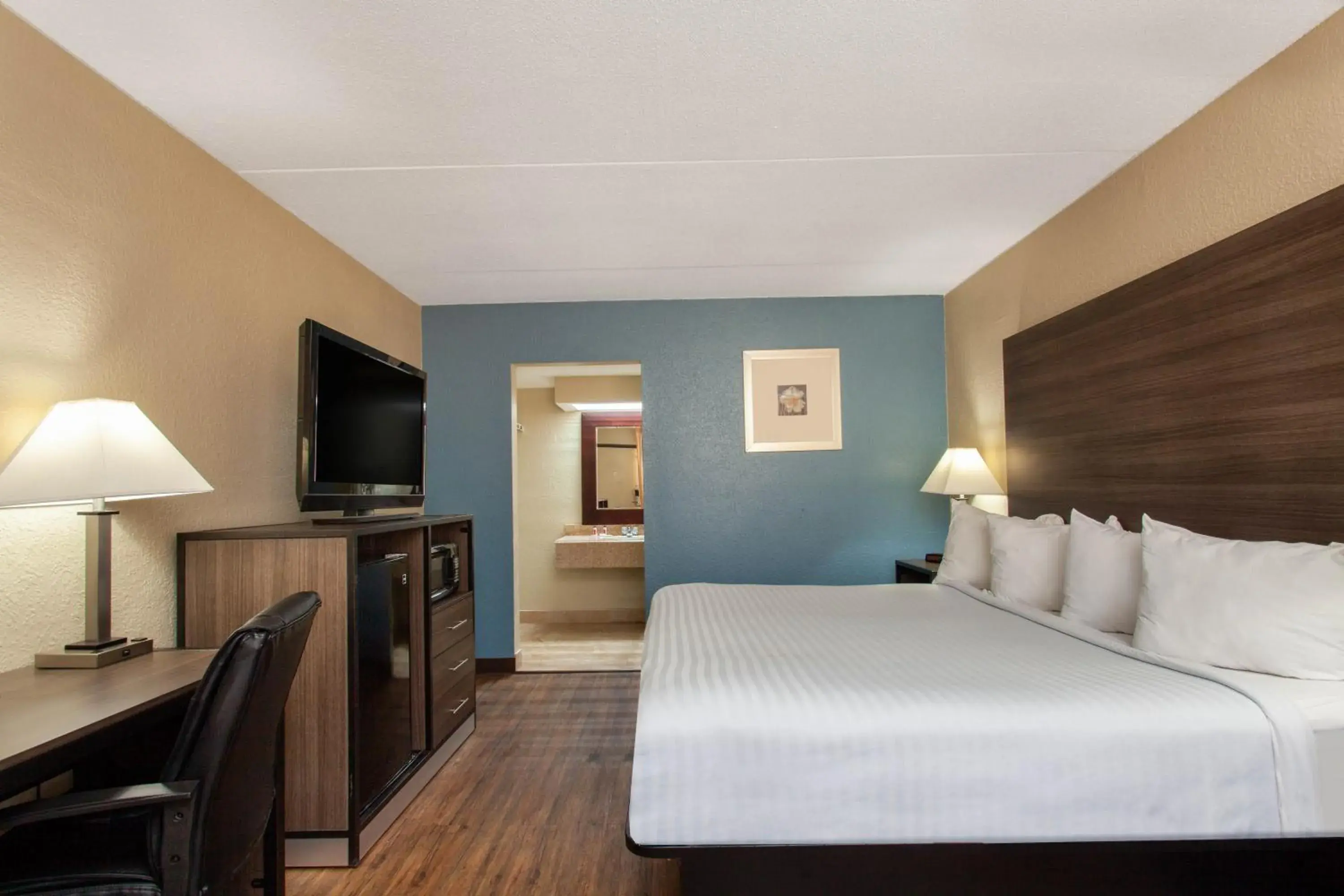 Bed in Travelodge by Wyndham Deltona