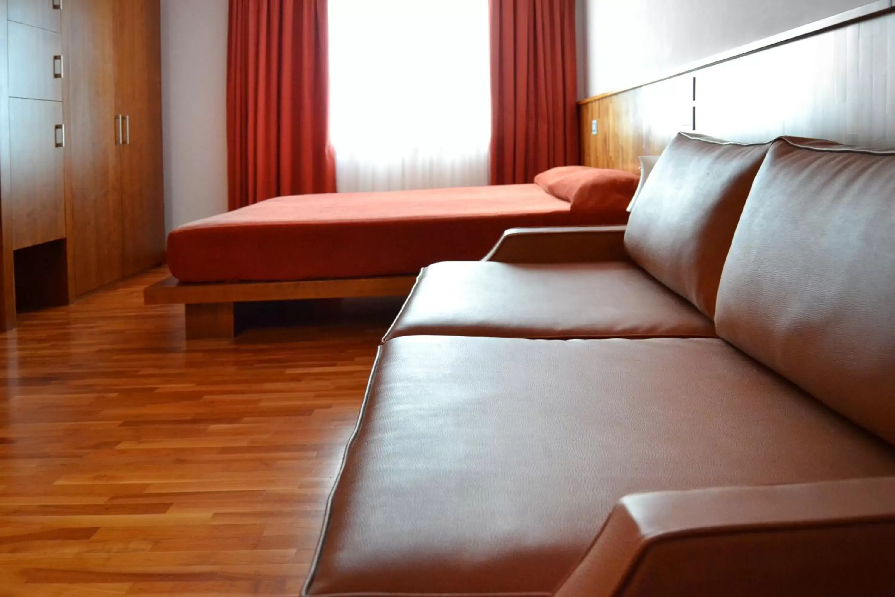 Bed, Seating Area in don guglielmo panoramic Hotel & Spa