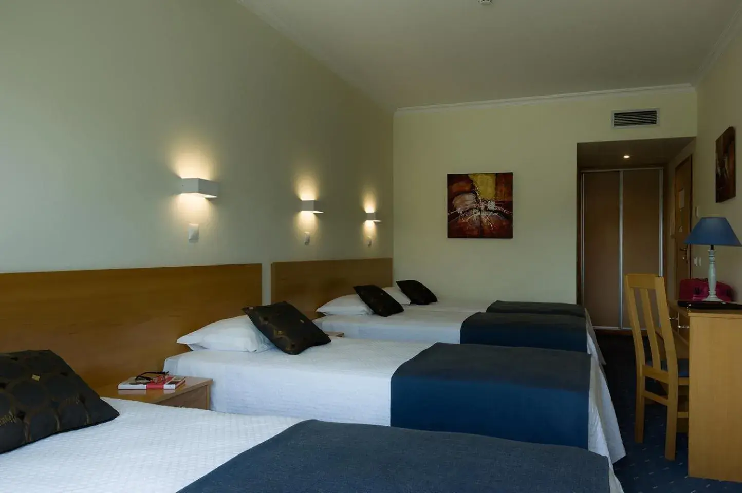 Bed in Cova da Iria Hotel