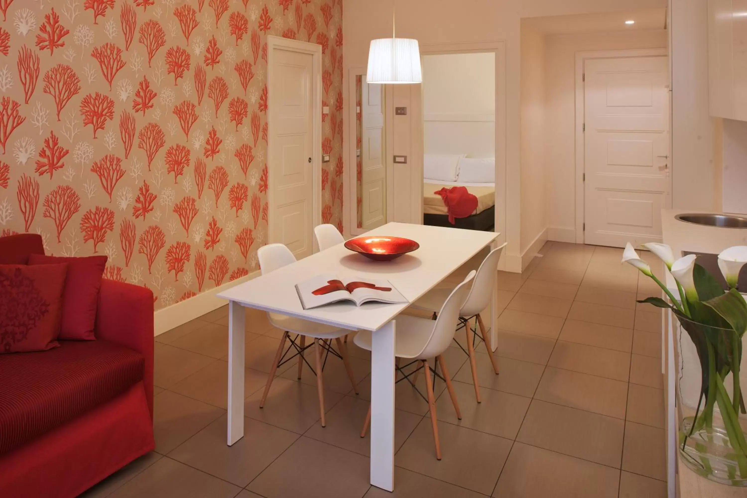 Living room, Dining Area in Le Rose Suite Hotel