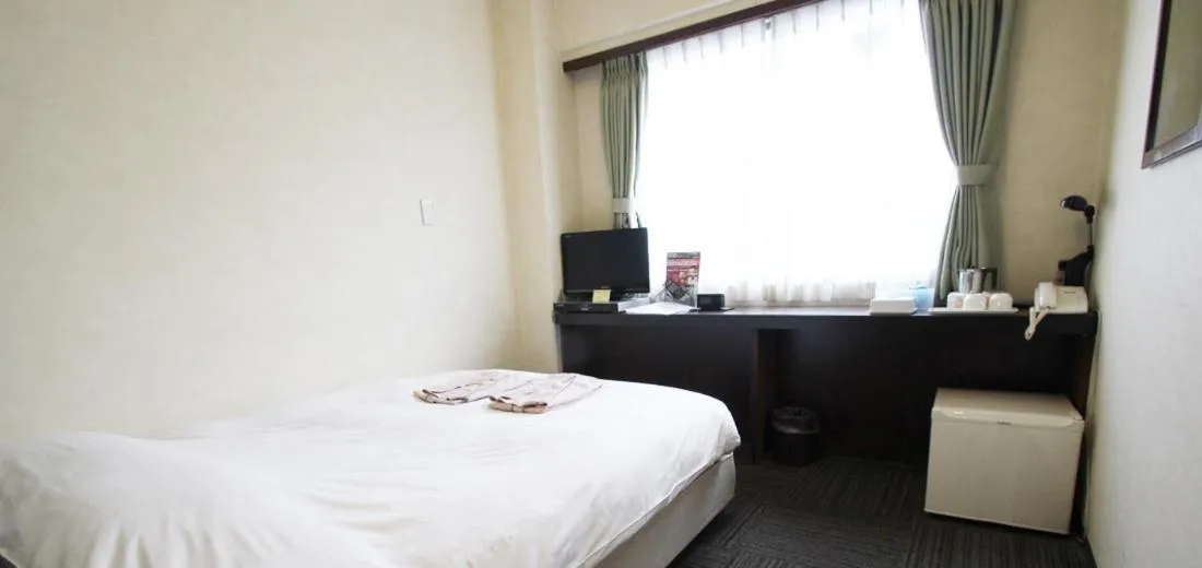 Bed in Takamatsu City Hotel