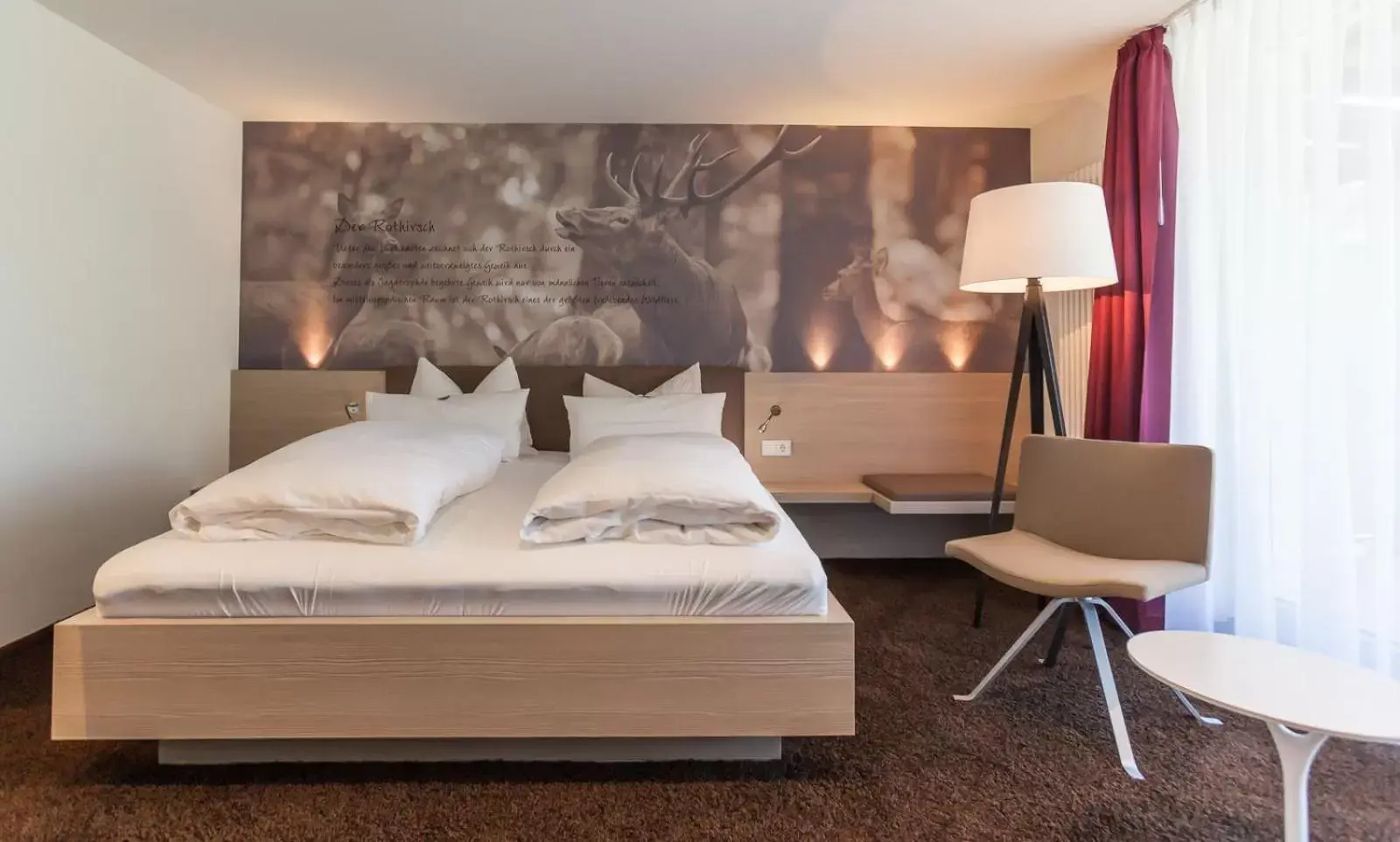 Photo of the whole room, Bed in Bollenhuthotel Kirnbacher Hof