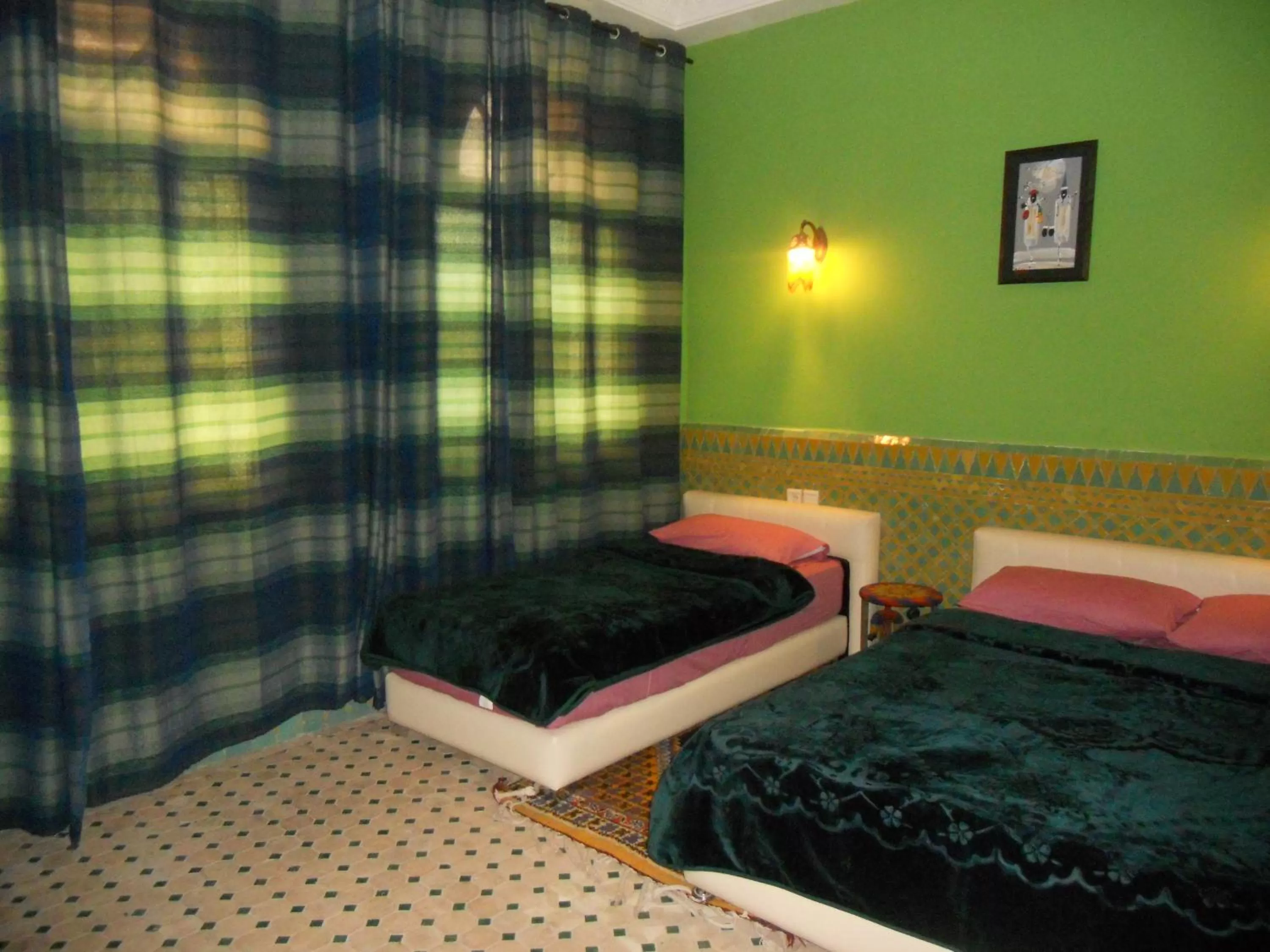 Bed in Riad Passiflora