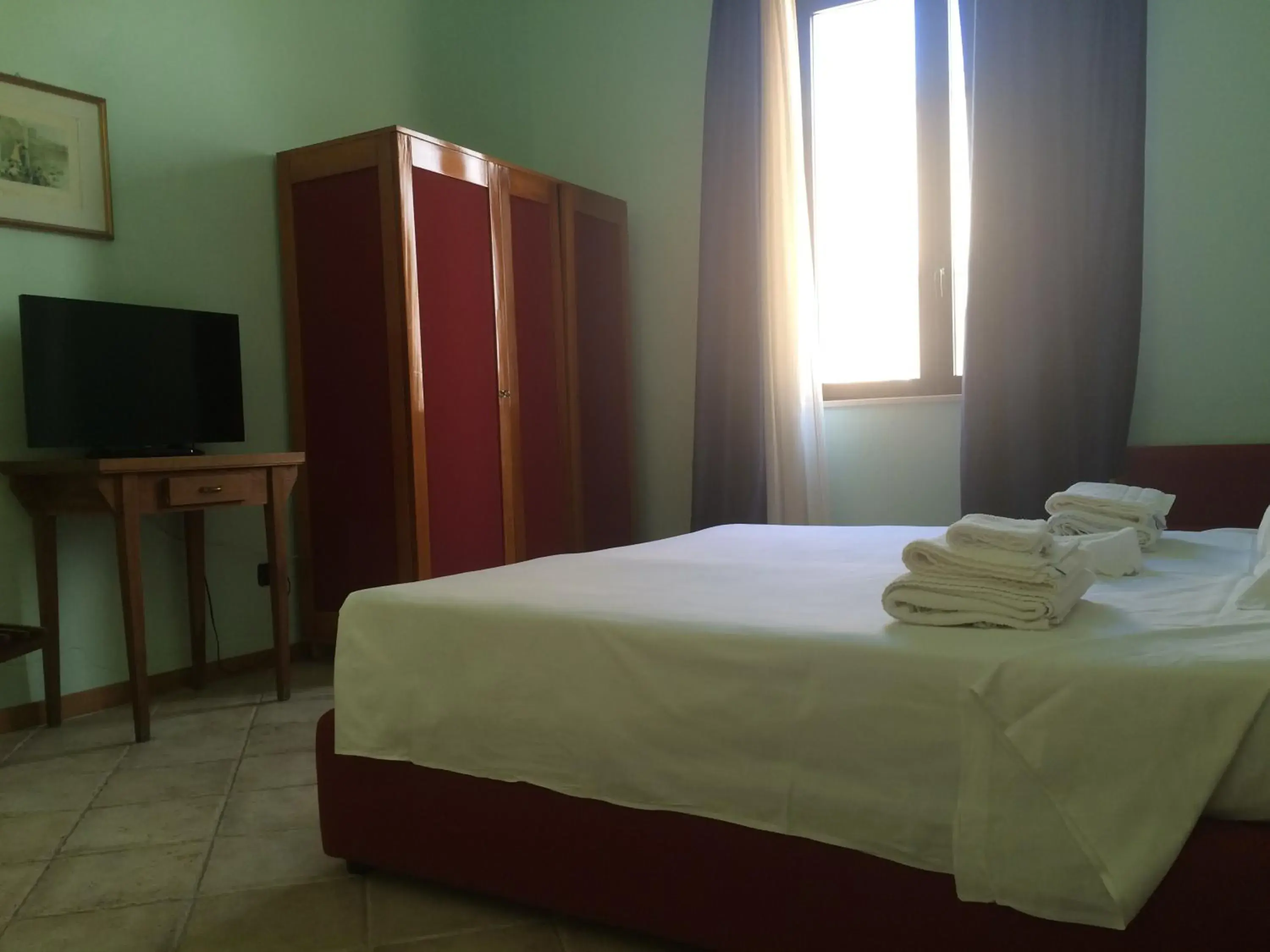 Bed in Hotel Miramare