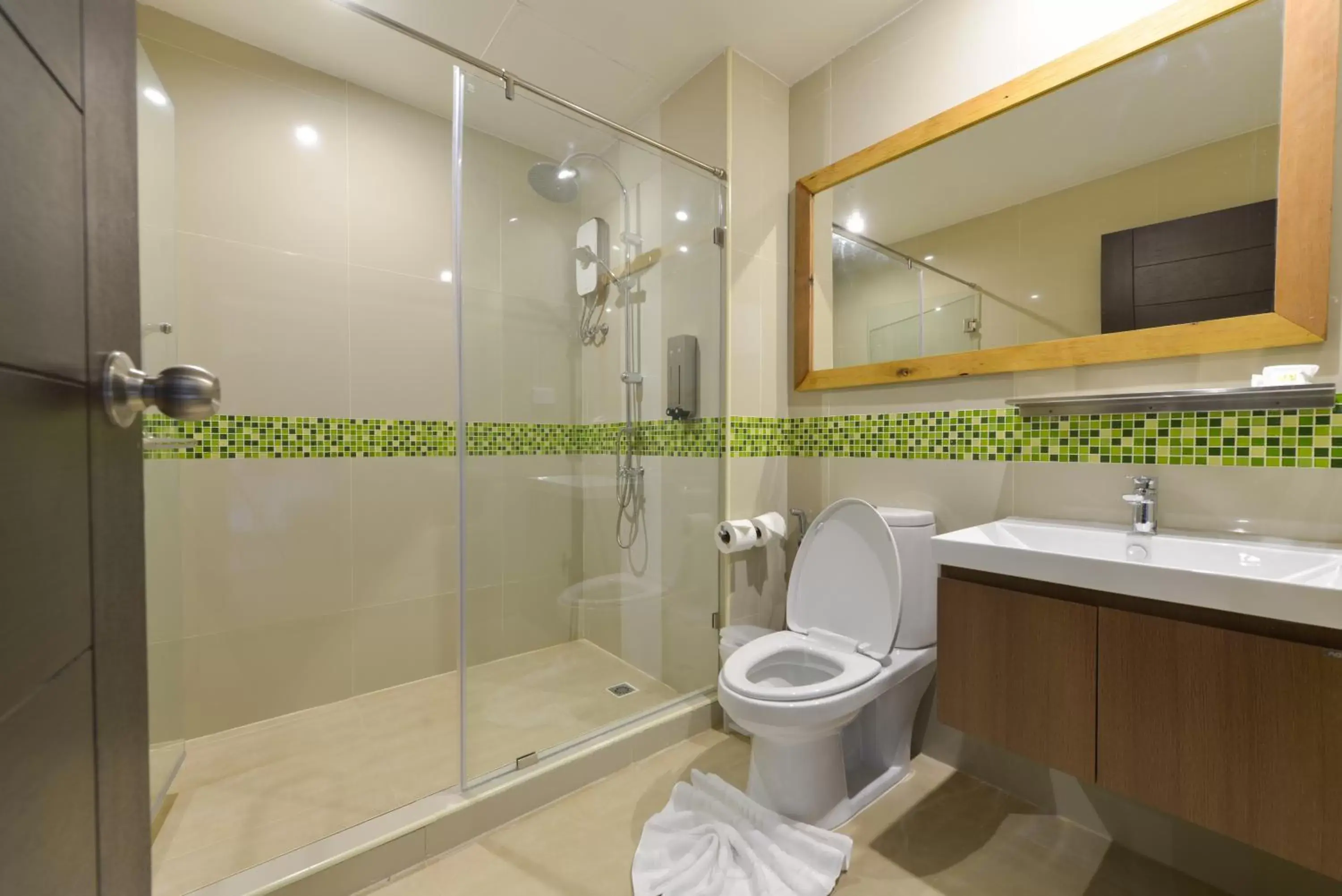 Bathroom in Brown House Hotel by Blu Monkey - SHA Extra Plus