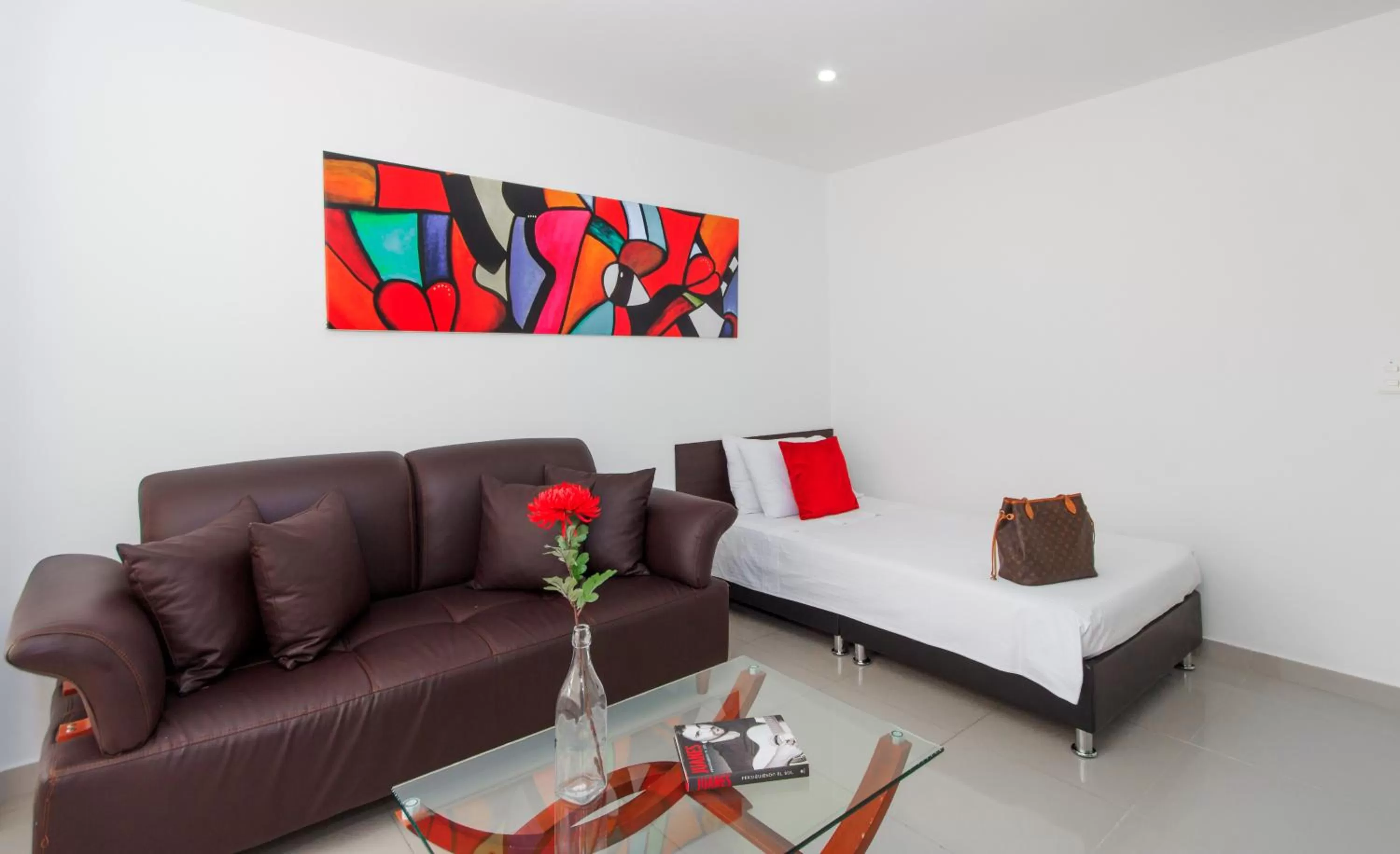 Bed in 122 Plaza Apartahotel