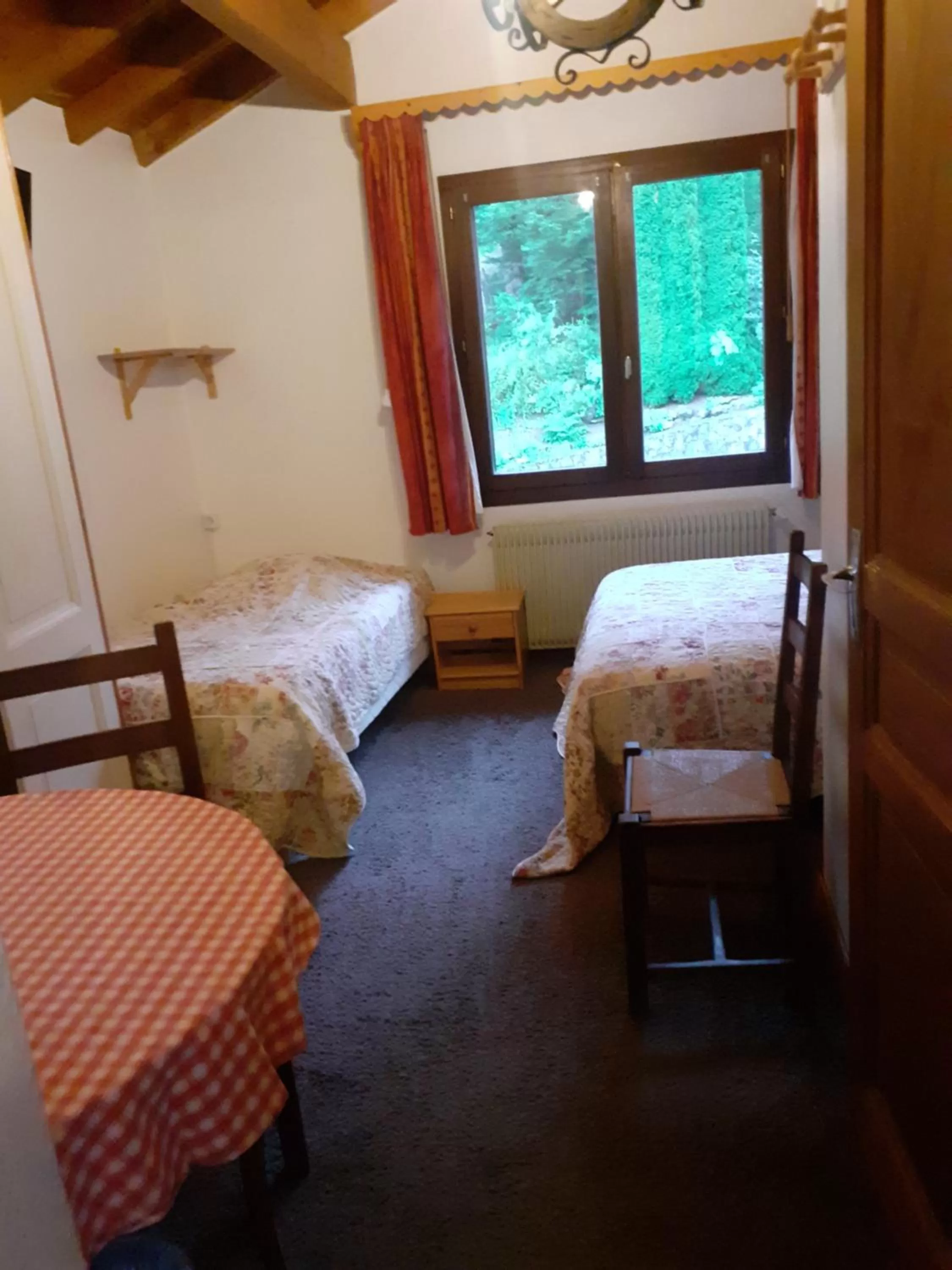 Bed in Hotel Bergerie Chatel