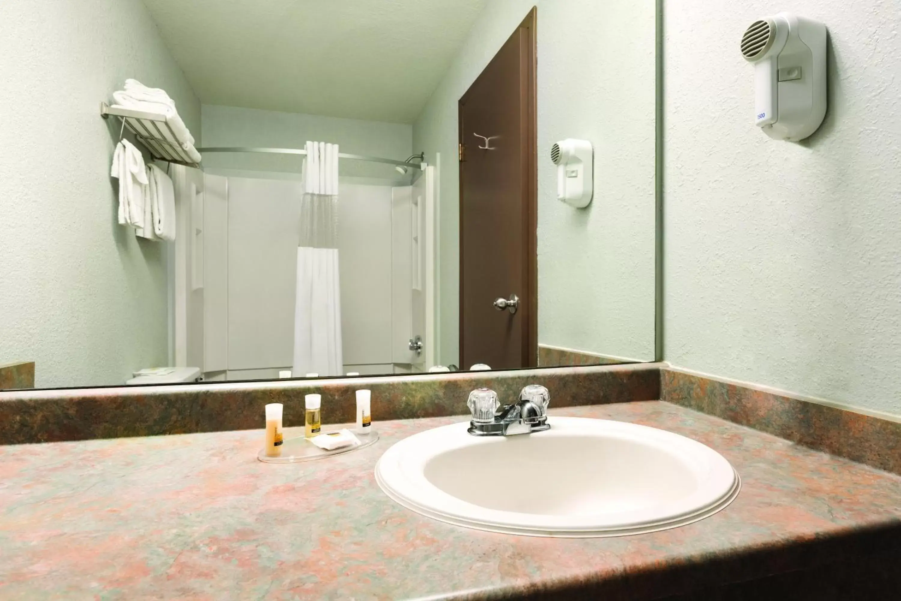 Bathroom in Days Inn by Wyndham High Prairie