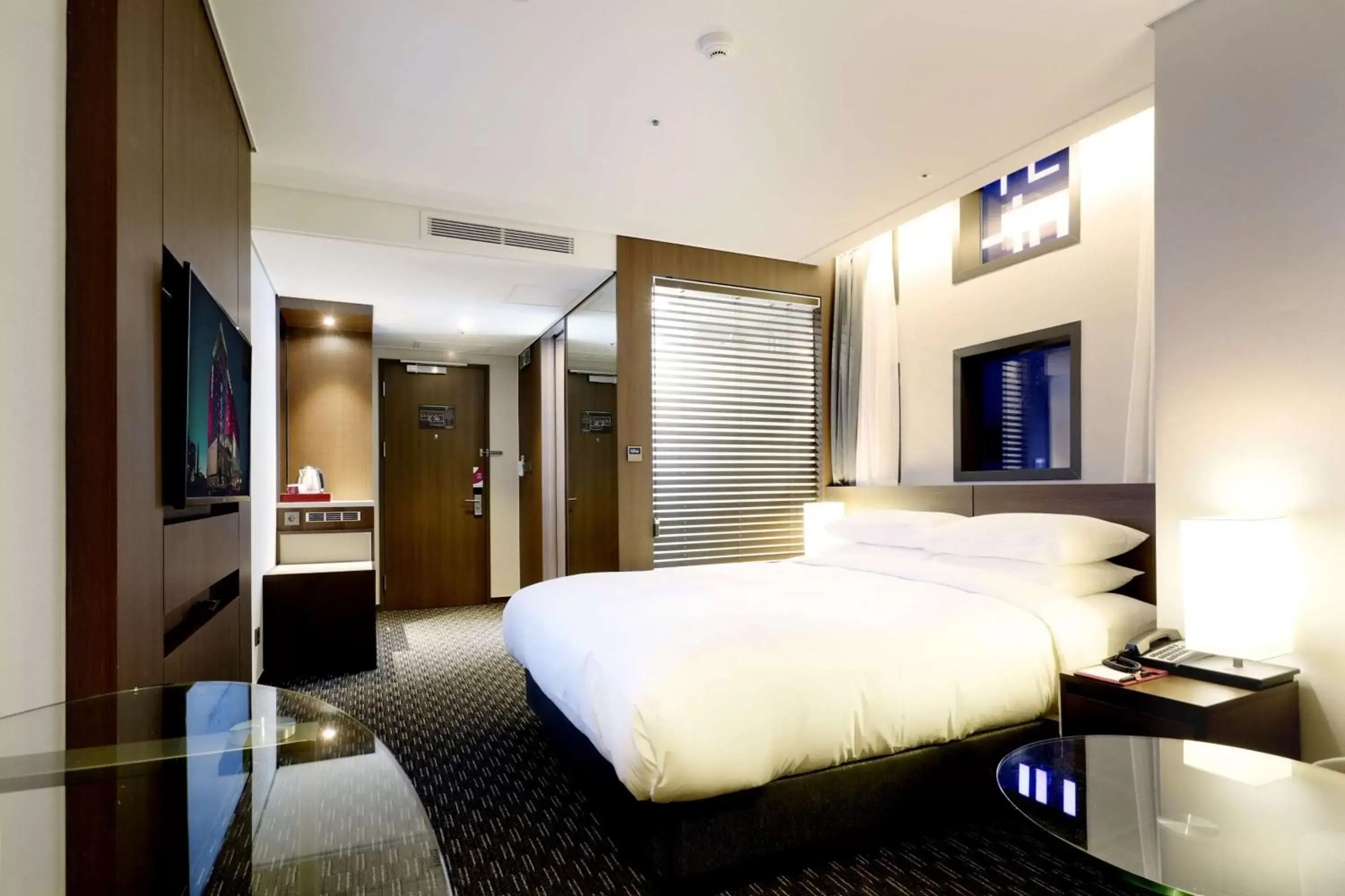 Photo of the whole room, Bed in Ramada Encore by Wyndham Busan Station