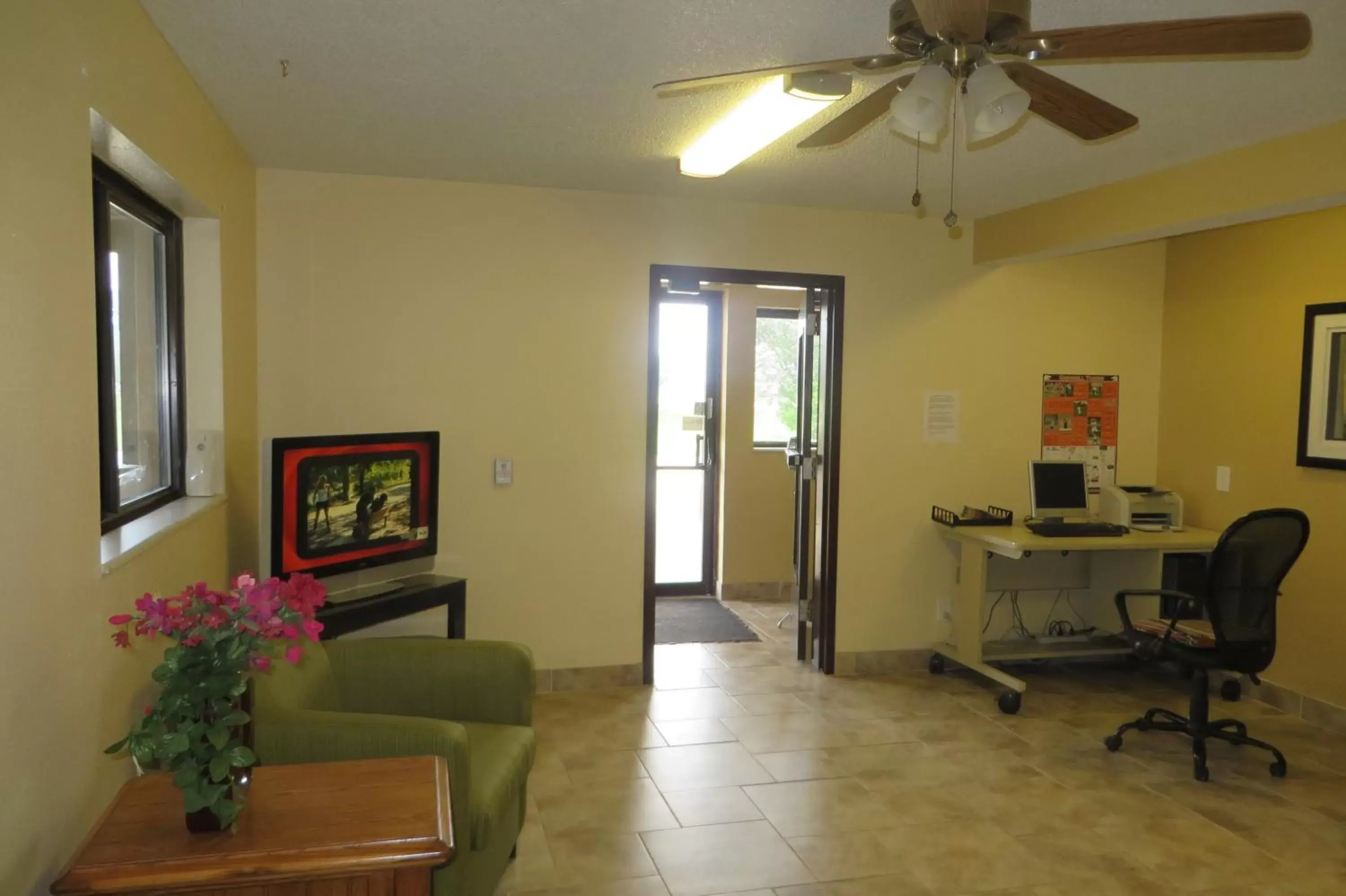 Lobby or reception in Super 8 by Wyndham Grinnell IA Lobby or reception in Super 8 by Wyndham Grinnell IA