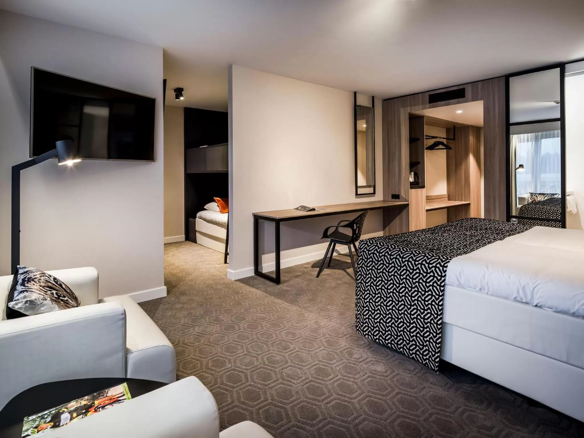 Seating area, Bed in Hotel Van der Valk Maastricht