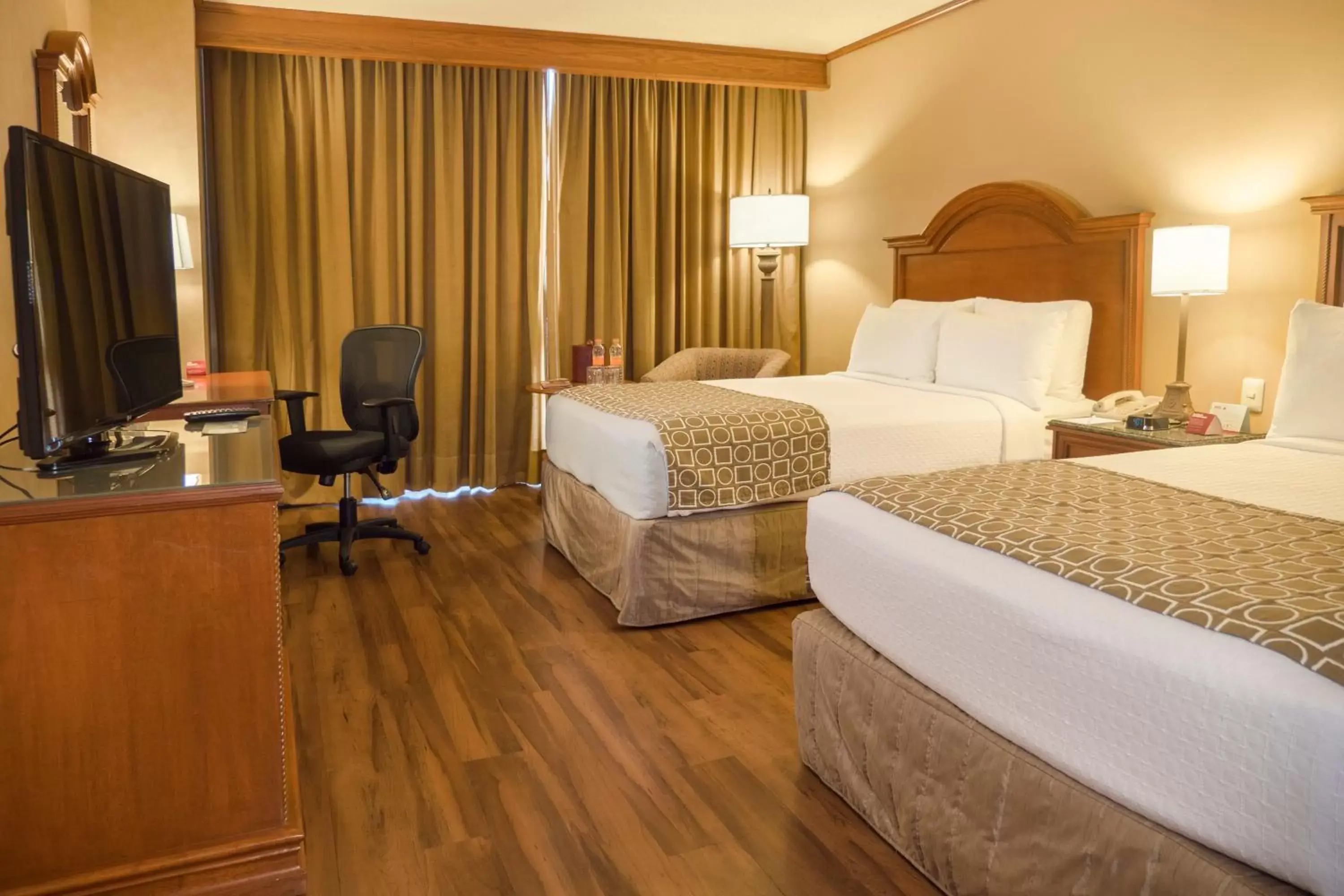 Photo of the whole room, Bed in Crowne Plaza Hotel Monterrey, an IHG Hotel