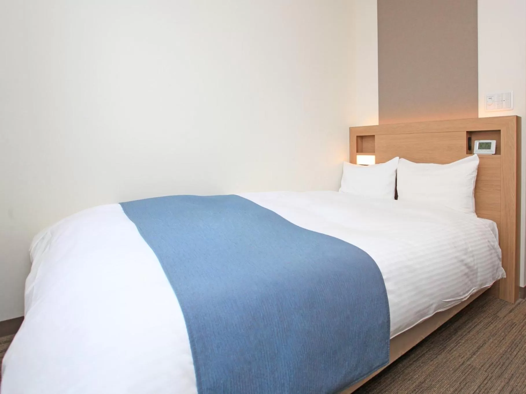 Bed in Urban Hotel Kusatsu