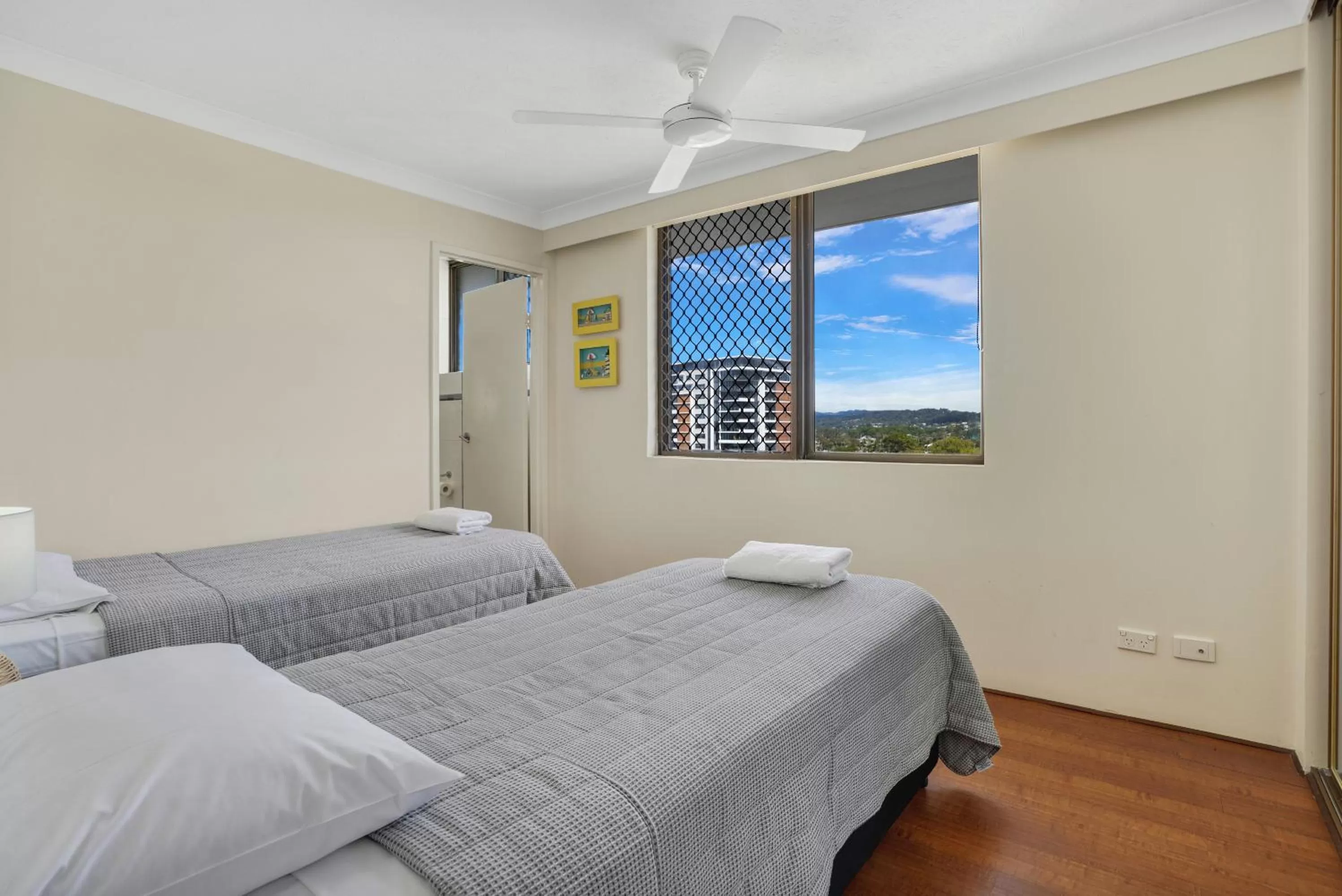 Bed in Beach Palms Holiday Apartments