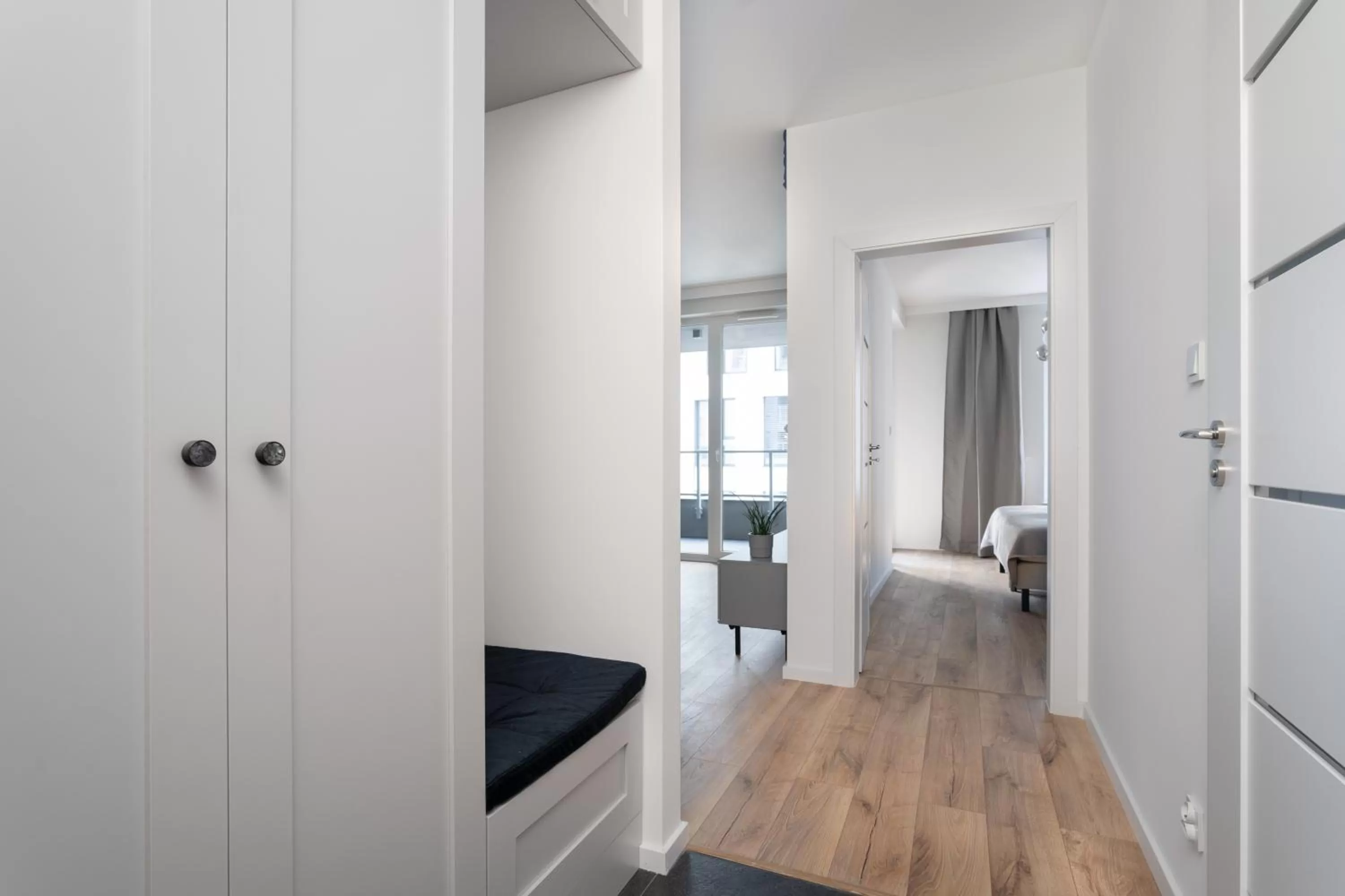 Bed in Symphony Modern Tower Apartamenty