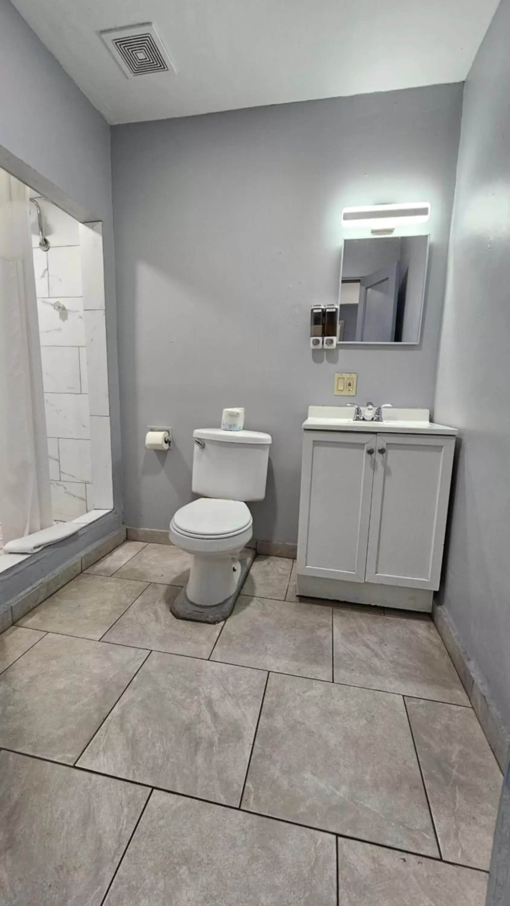 Toilet, Bathroom in Travelers Inn