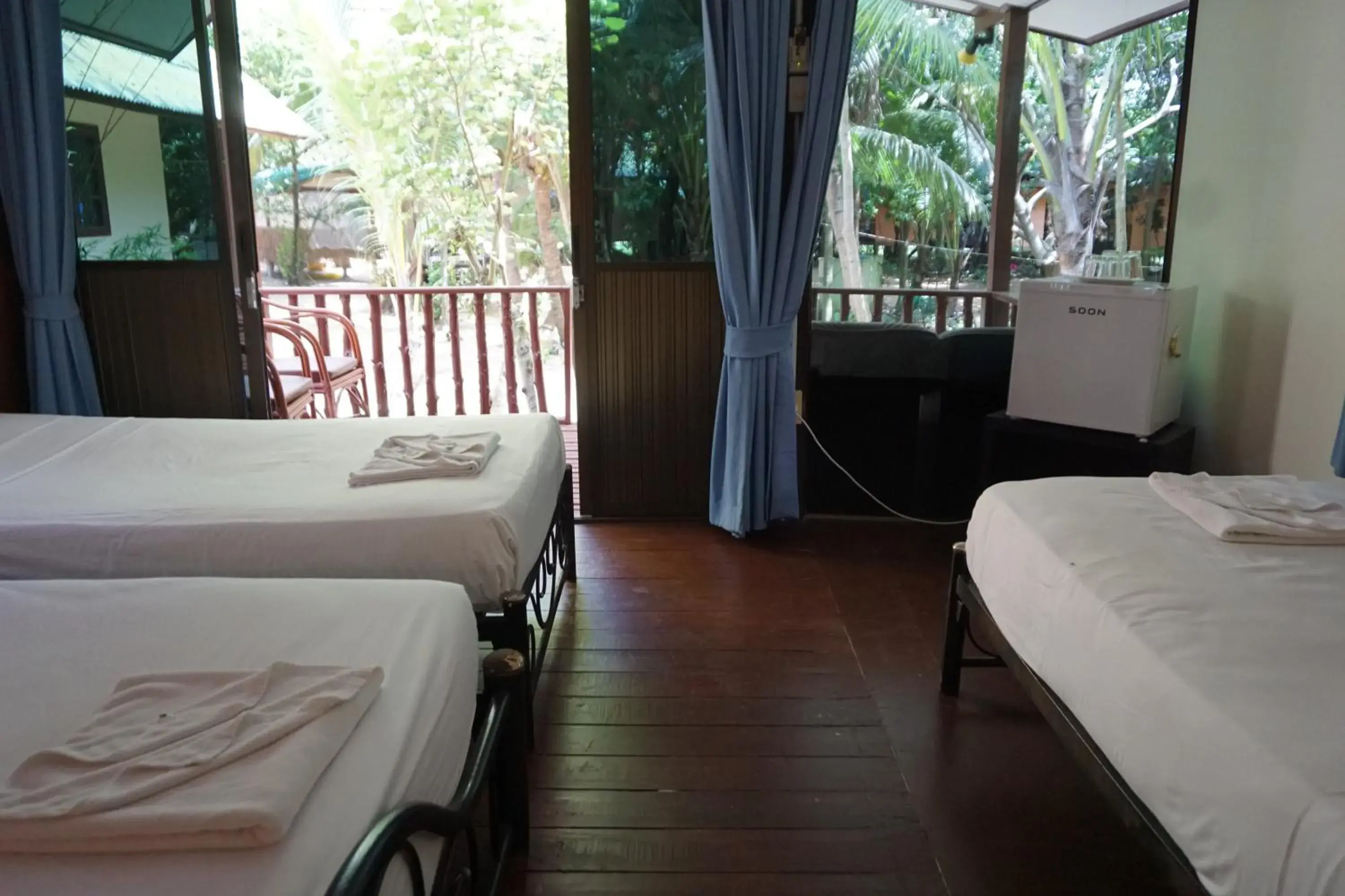 Bed in Moonhut Bungalows