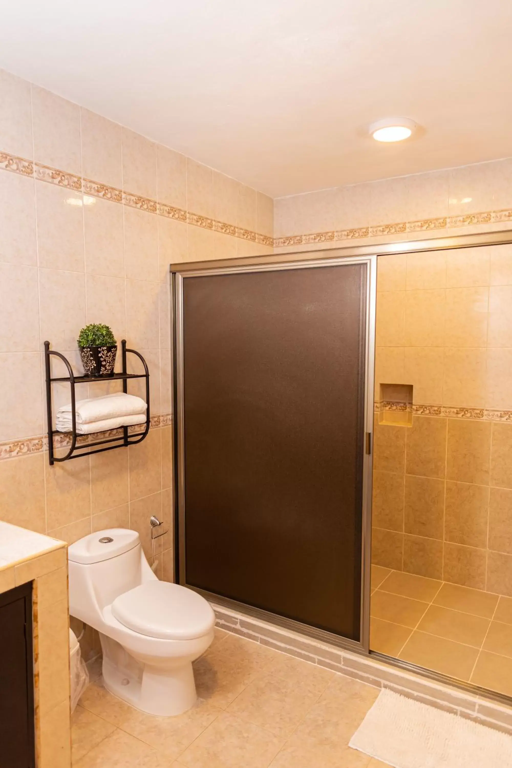 Bathroom in Santa Fe Studios And Suites