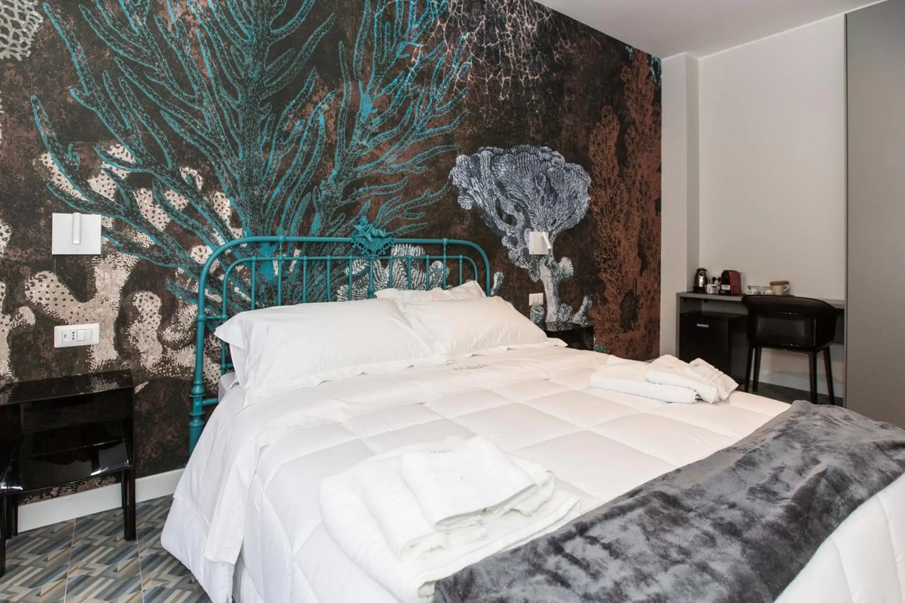 Bed in Malù Suites Bed in Malù Suites