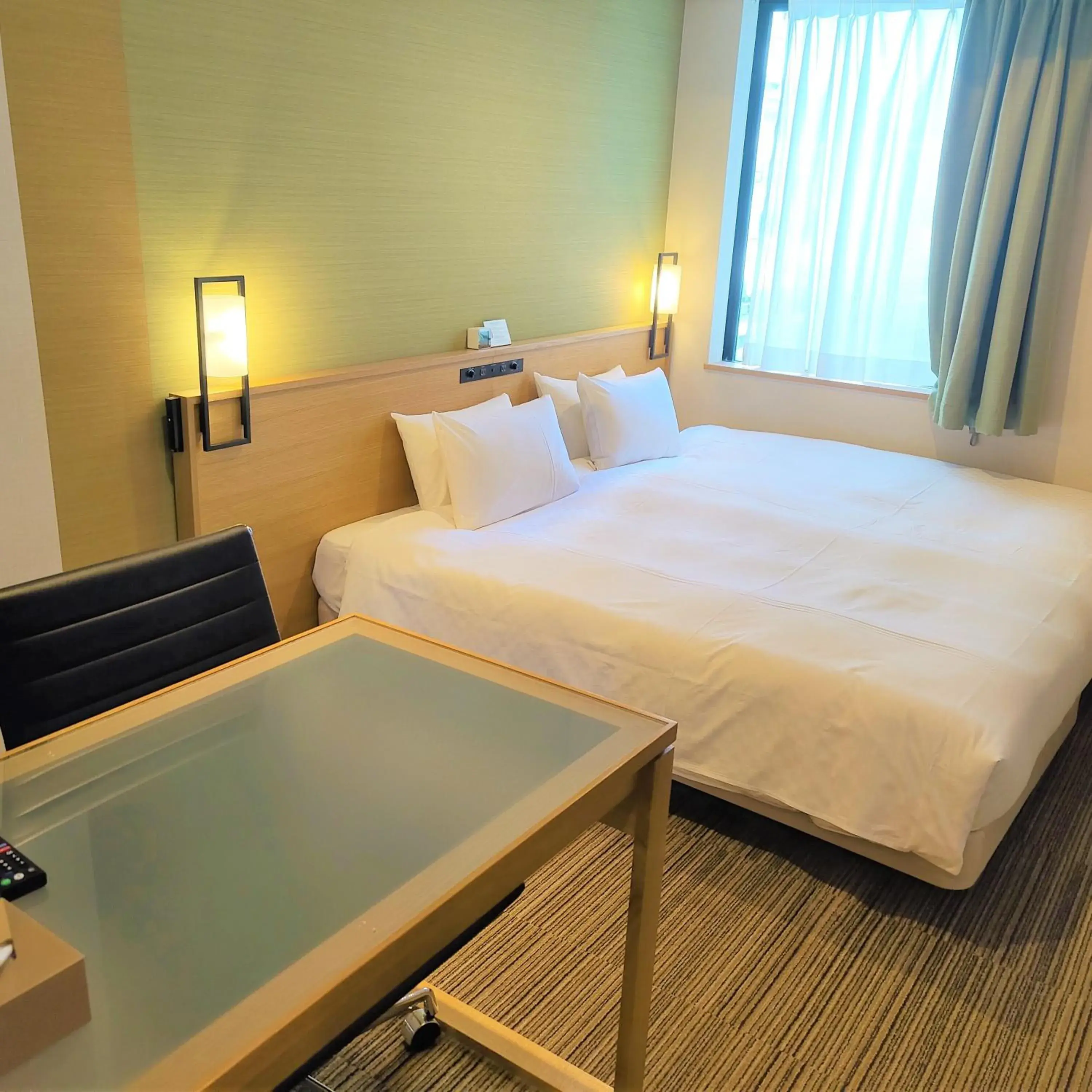 Bed in Candeo Hotels Hiroshima Hatchobori