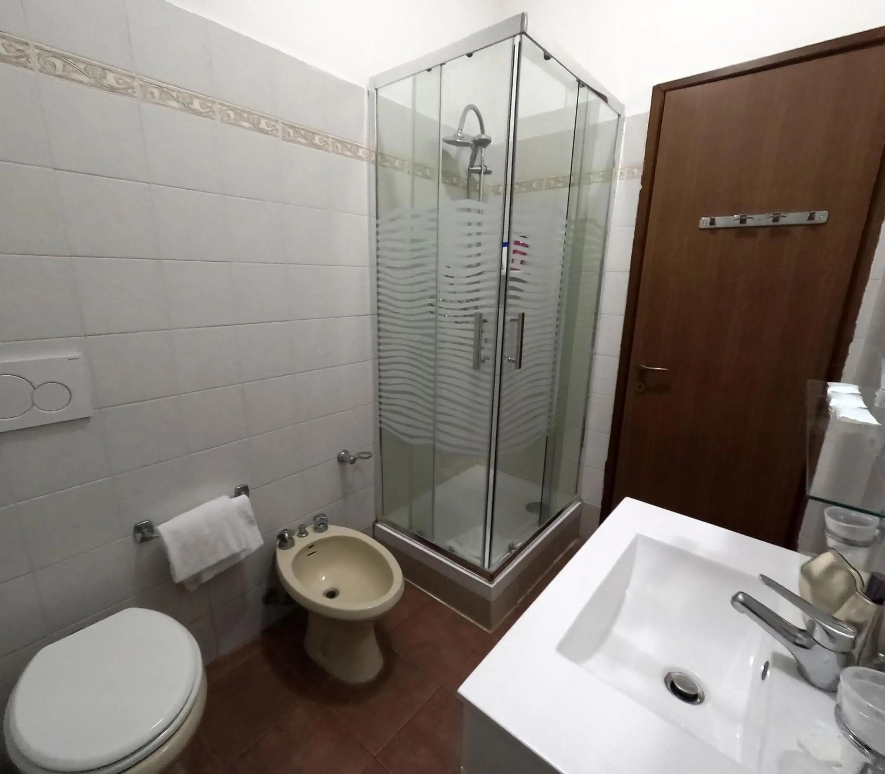 Bathroom in ROMA ROOM HOTEL