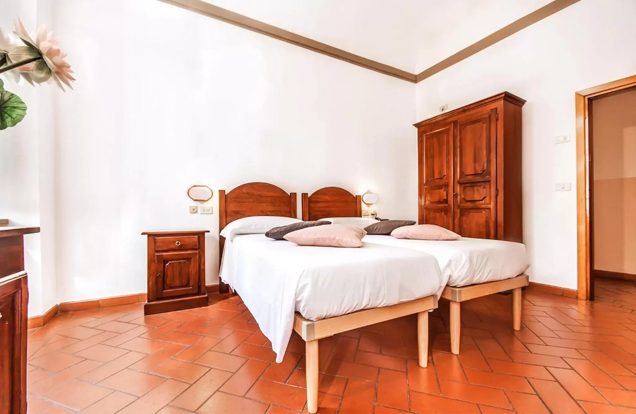 Bed in Hotel Costantini
