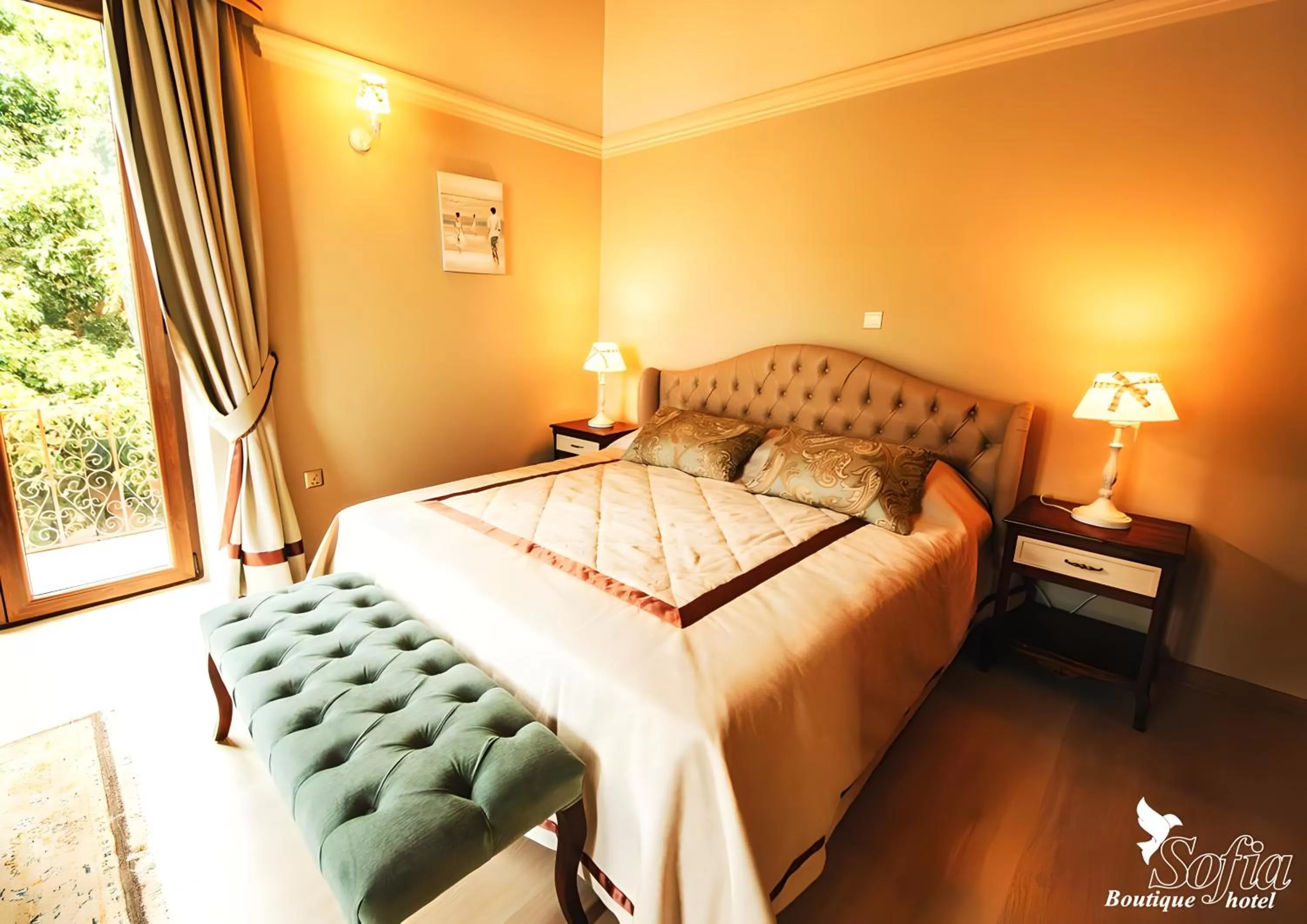 Bed in SOFIA BOUTIQUE HOTEL