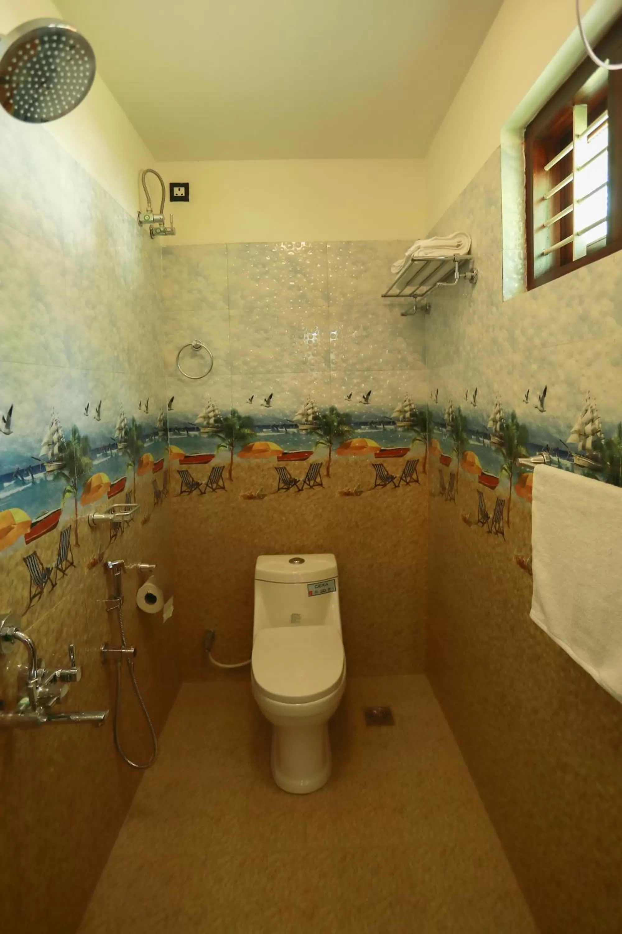 Toilet in LEISURE VALLEY BEACH RESORT