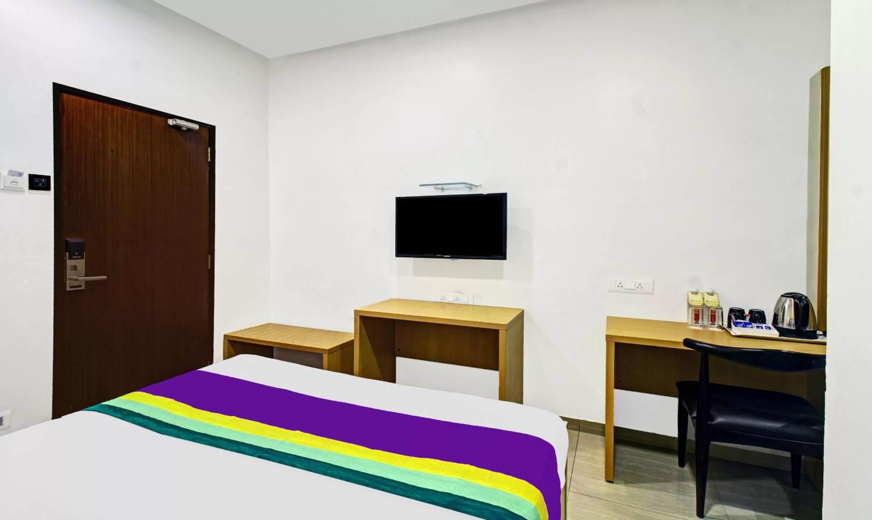 Bedroom, Bed in Treebo Premium Brijinn