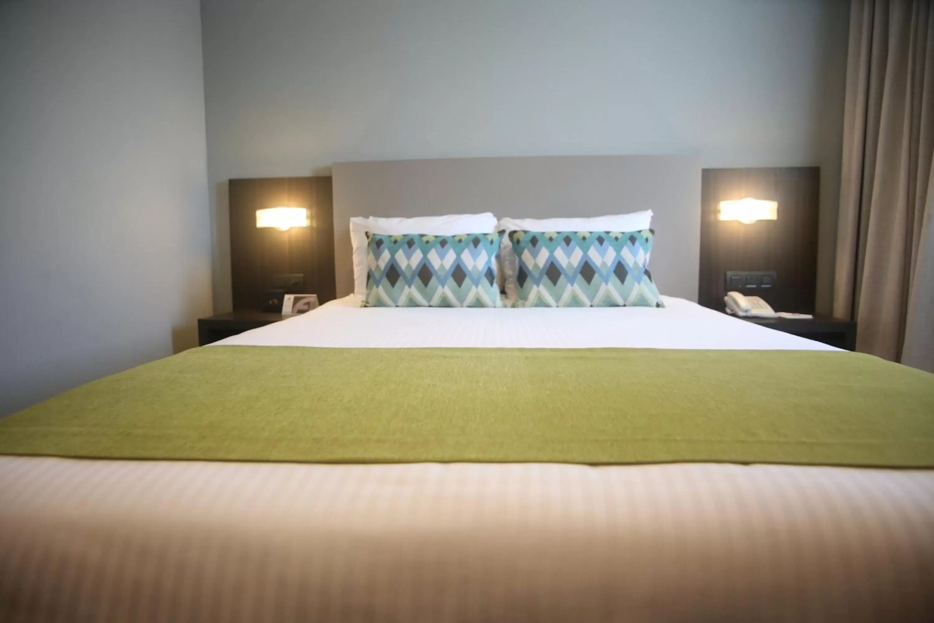 Bed in Aranjuez Hotel & Suites