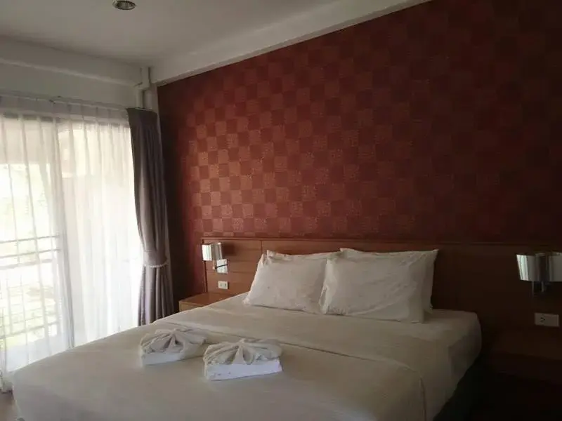 Bed in Palmari Boutique Hotel