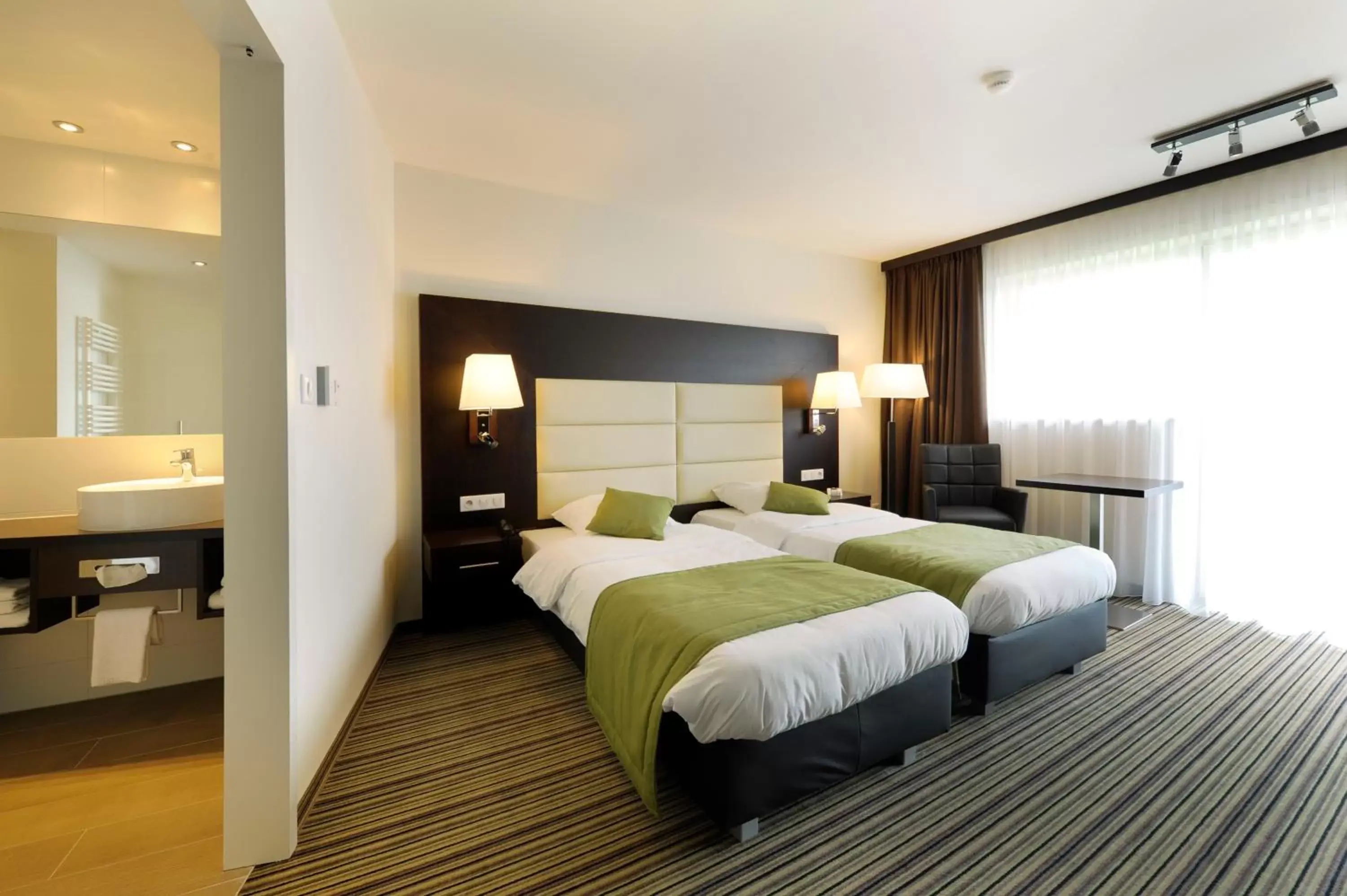 Bed in Hotel Charleroi Airport - Van Der Valk