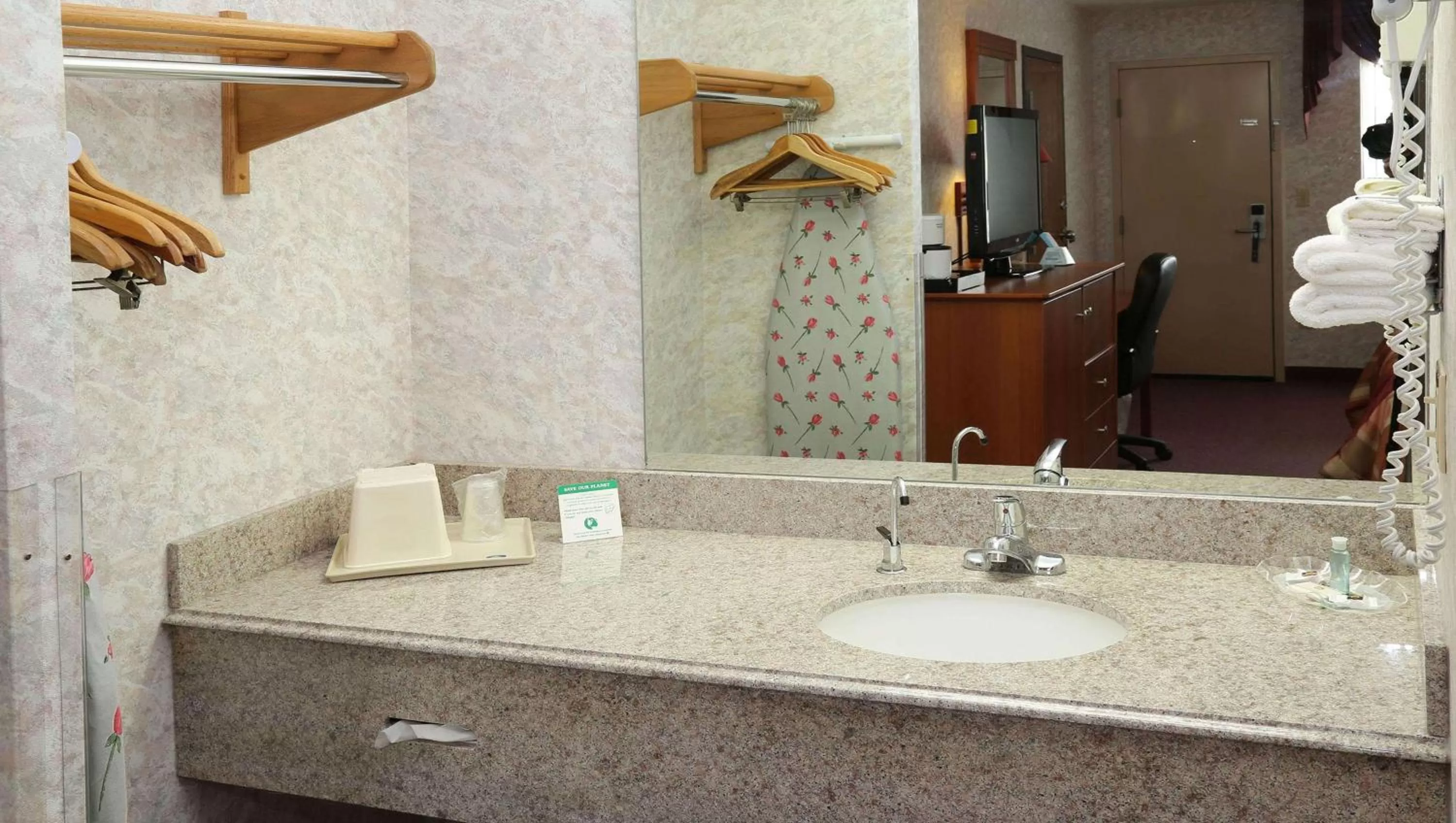 Photo of the whole room in Magnuson Hotel Howell/Brighton