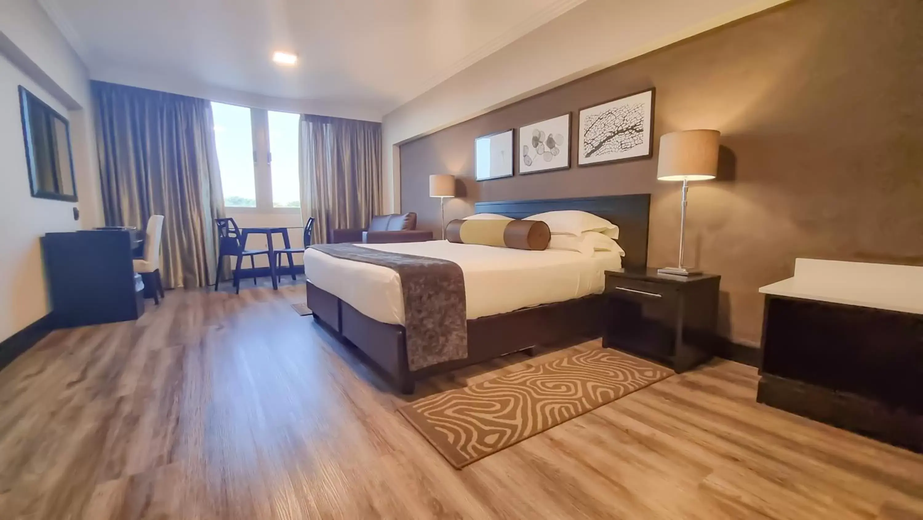 Bedroom, Bed in Belaire Suites Hotel