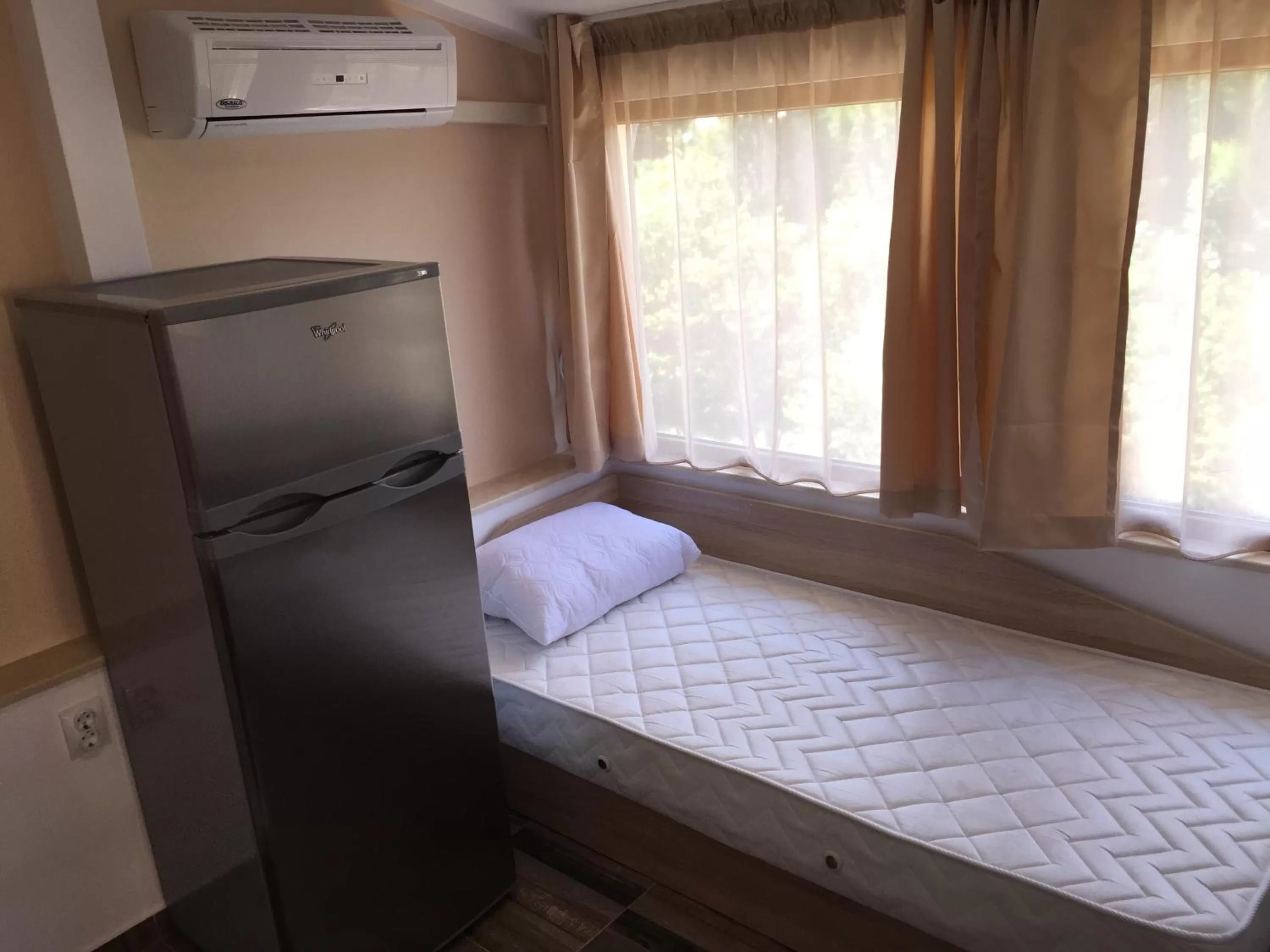 Bed in Family Hotel Malibu