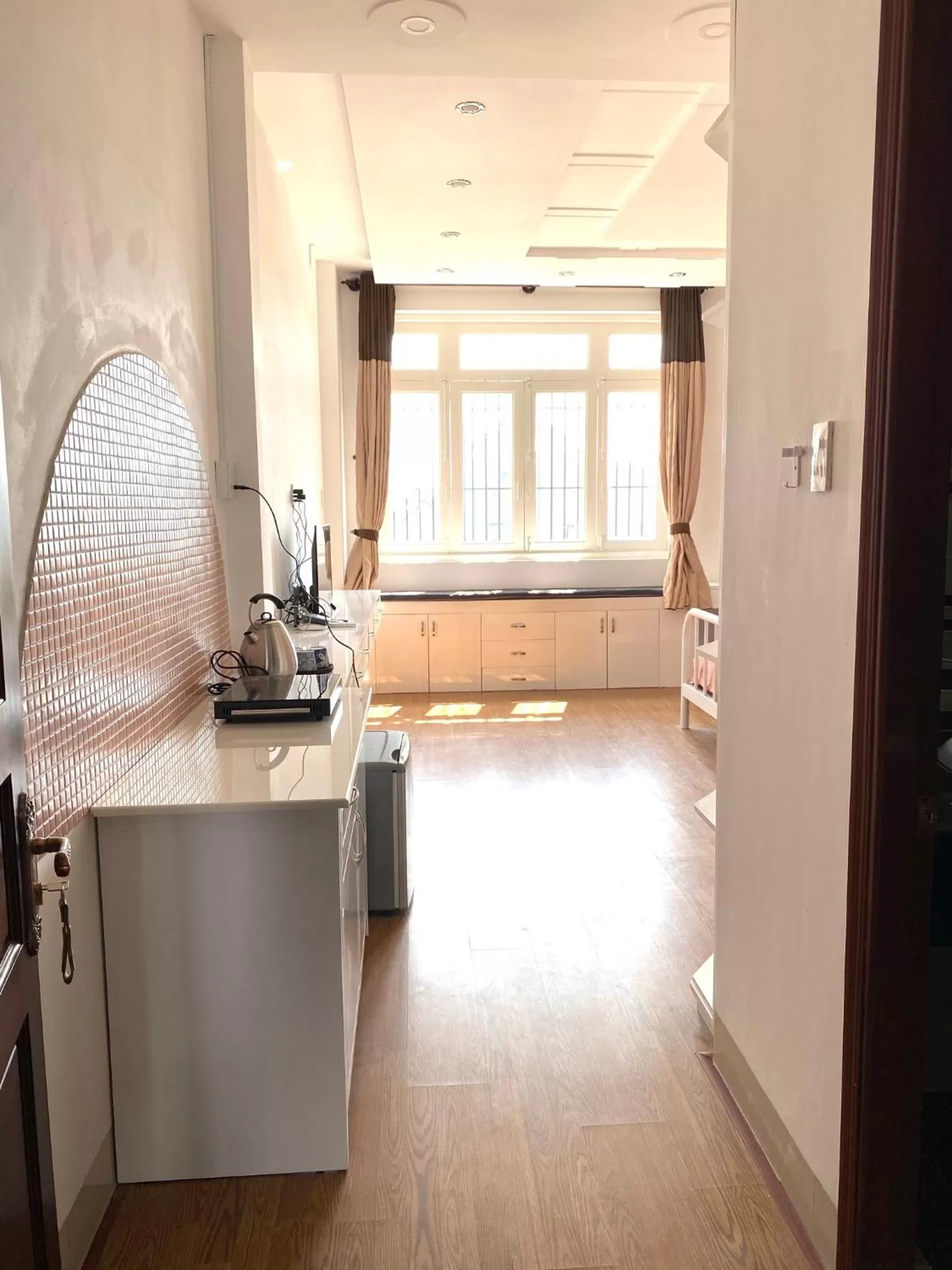 Kitchen/Kitchenette in Emerald Boutique Stay 2