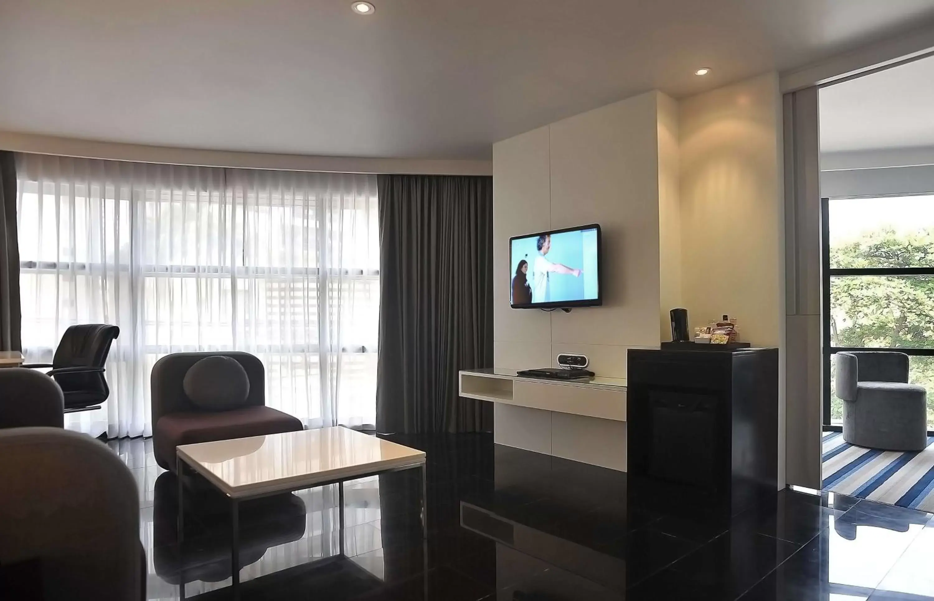 Photo of the whole room, TV/Entertainment Center in Best Western Sukhumvit 20