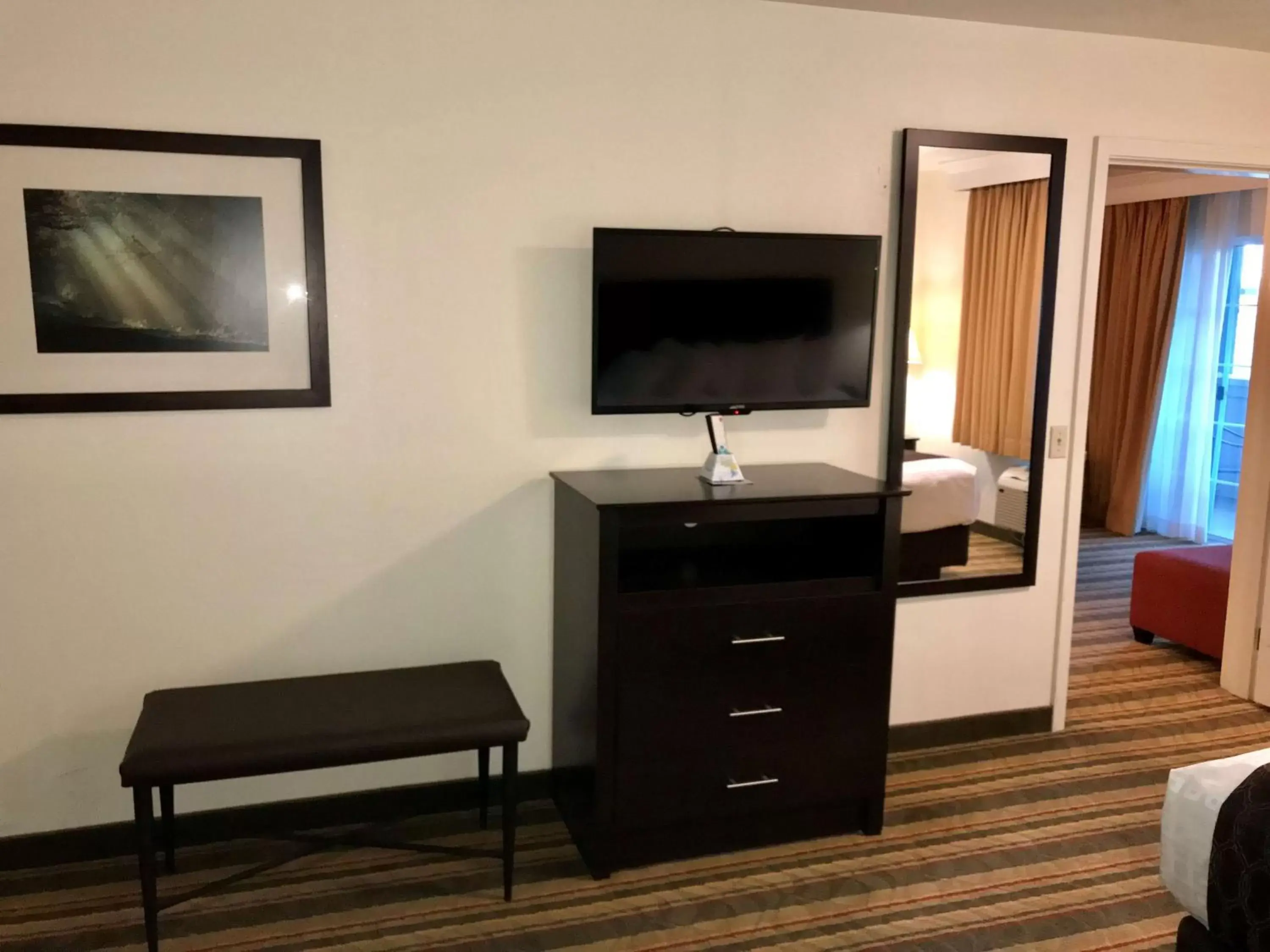 Photo of the whole room, TV/Entertainment Center in Best Western Visalia Hotel