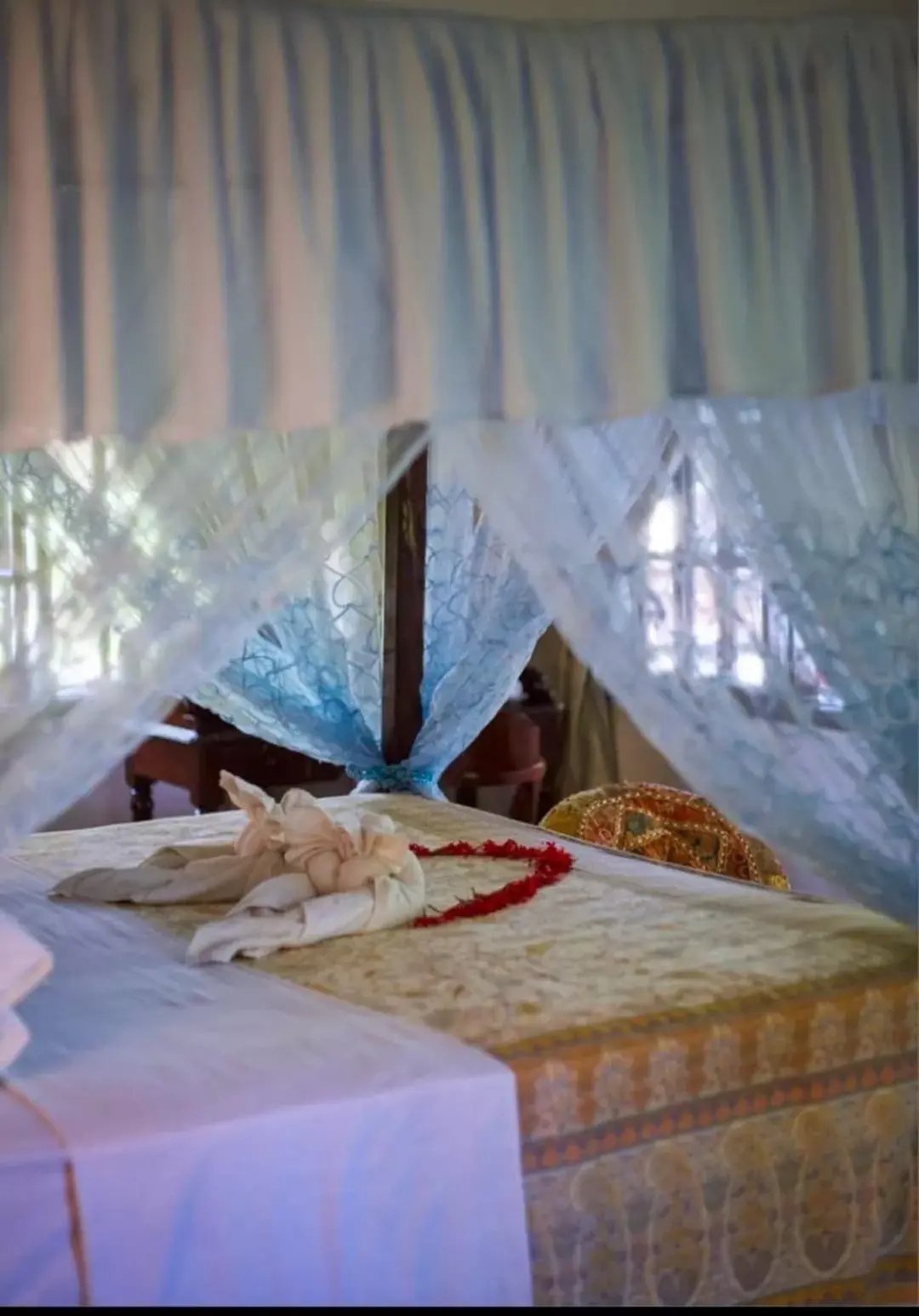 Bed in African House Resort