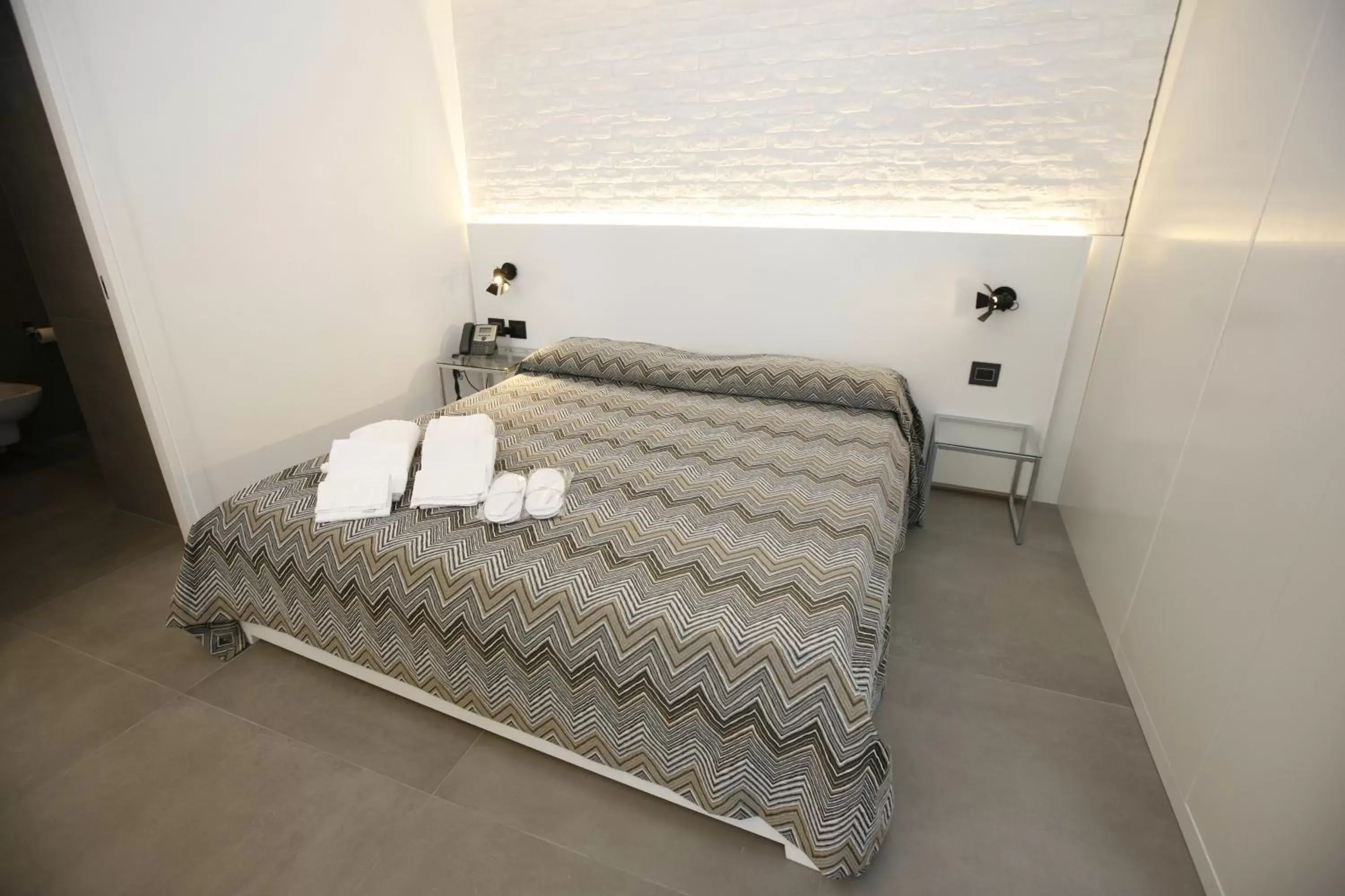 Bed in Relais Piazza Del Plebiscito B&B