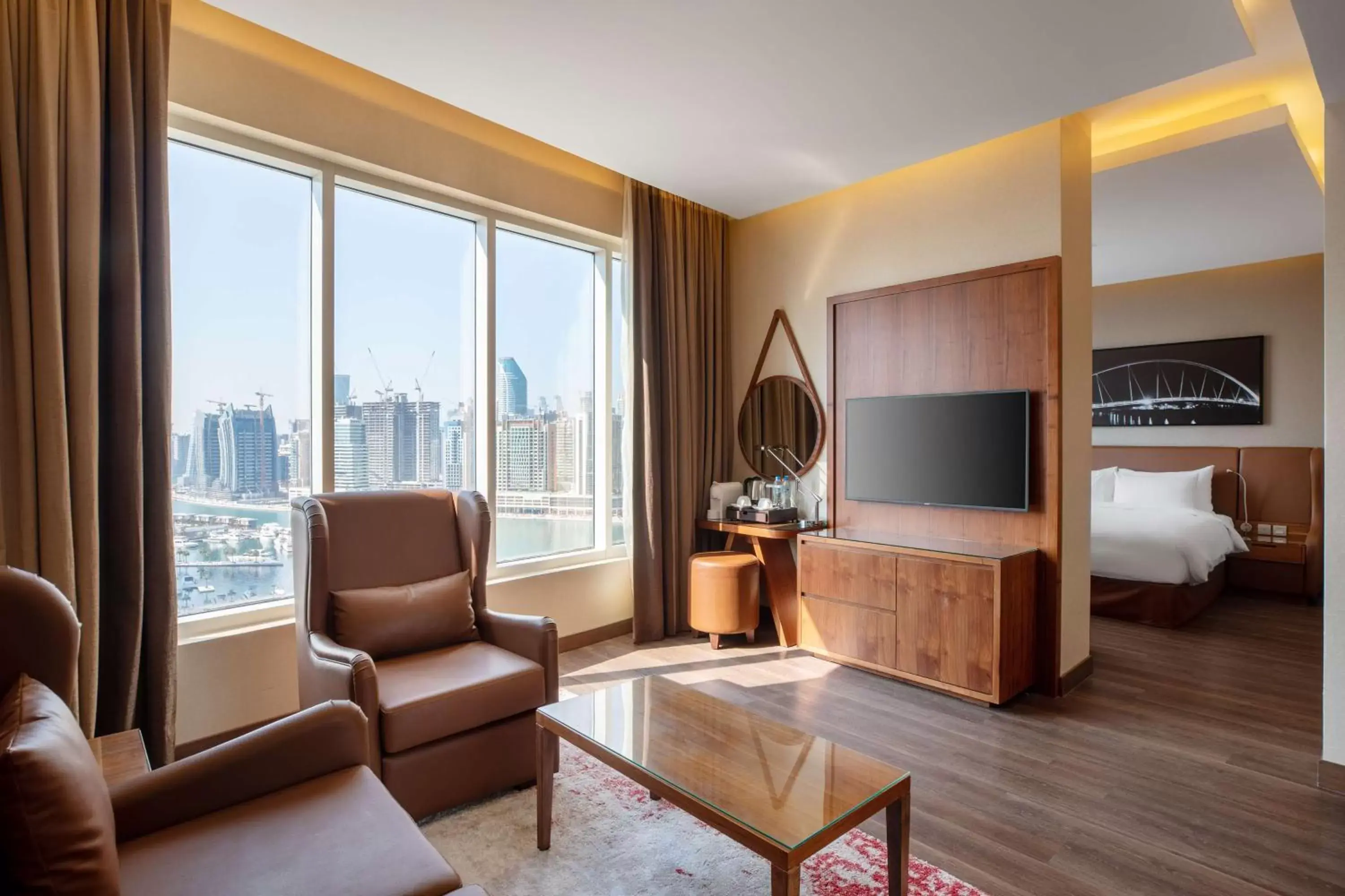 Photo of the whole room, TV/Entertainment Center in Radisson Blu Hotel, Dubai Canal View
